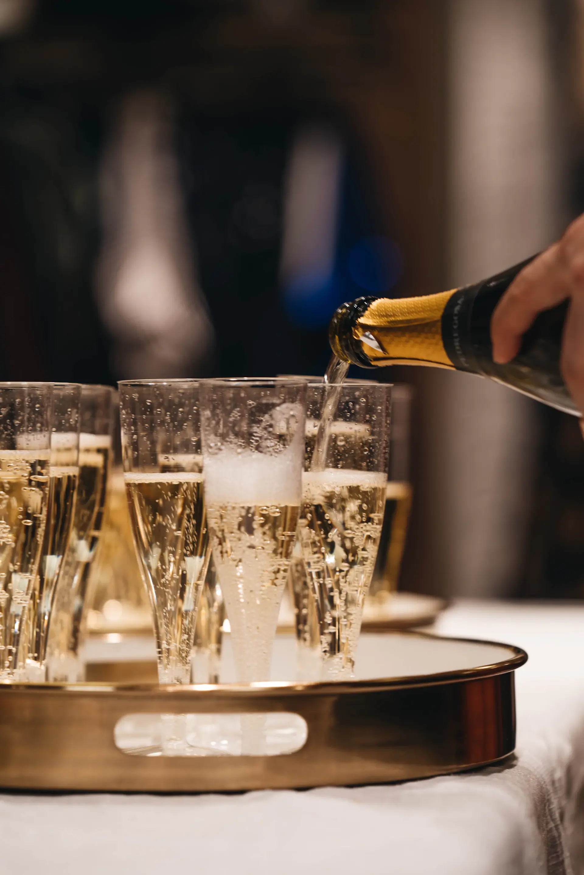 Champagne toast at golden hour