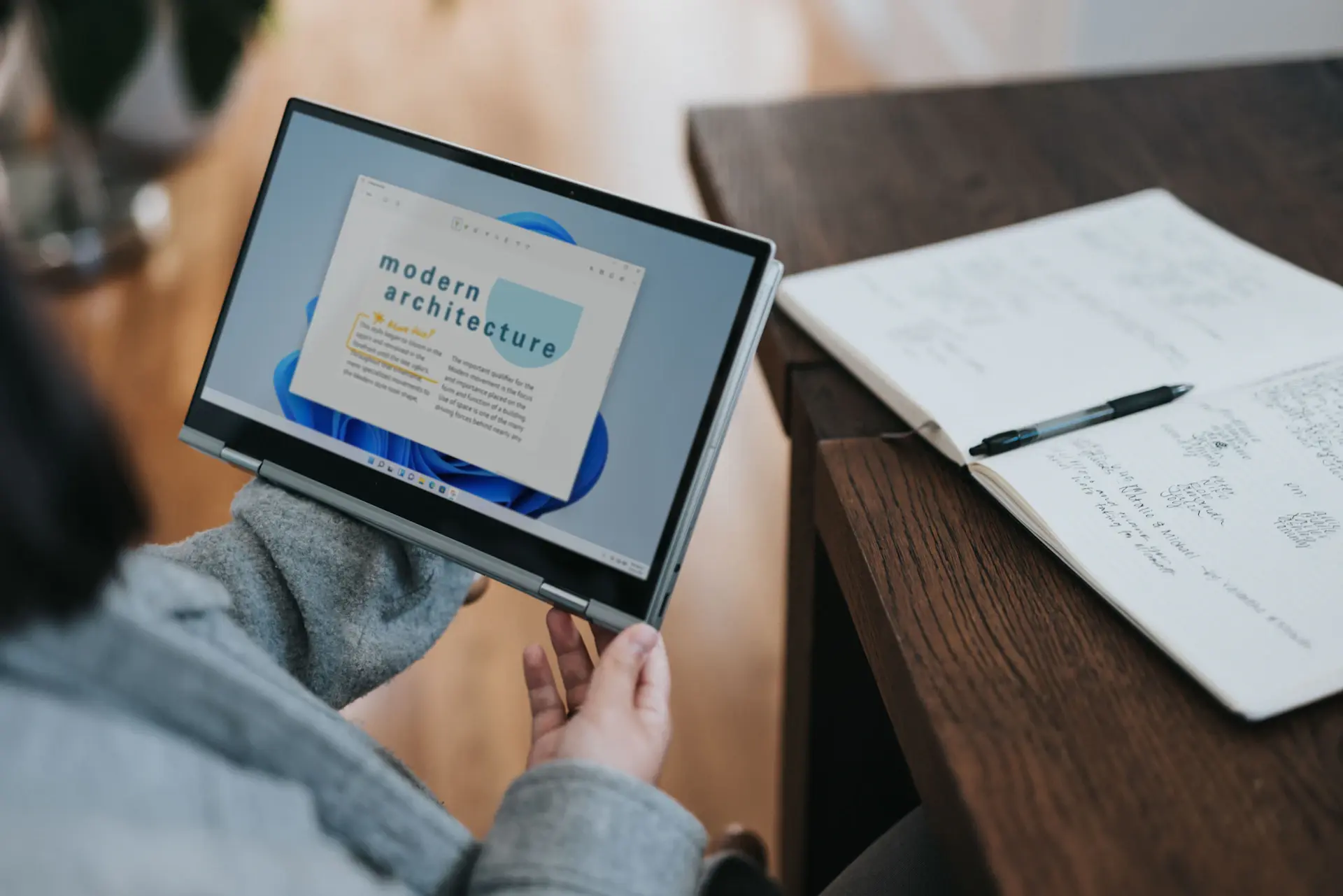 Designer reviewing interface mockups on screen
