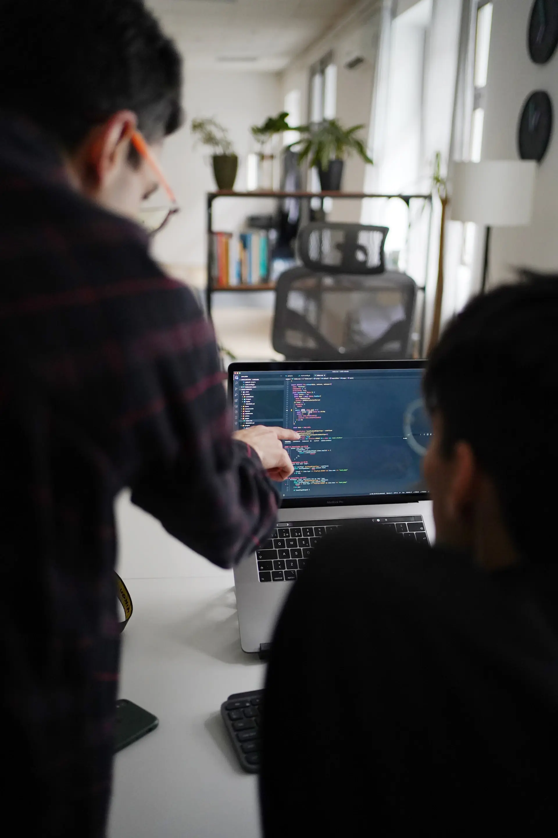 Two engineers pair programming