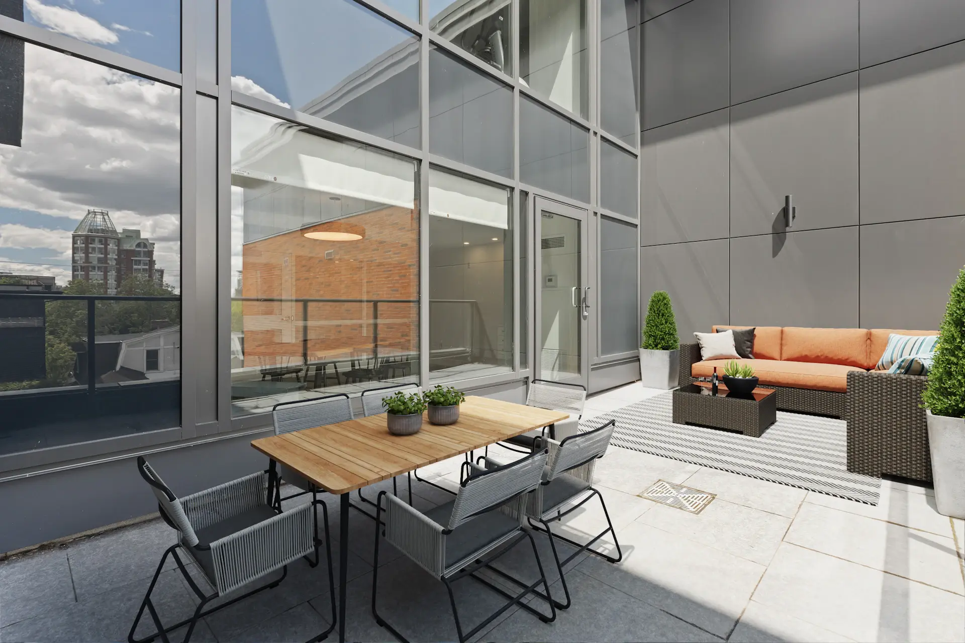 A cinematic residence interior opening onto a sunlit terrace
