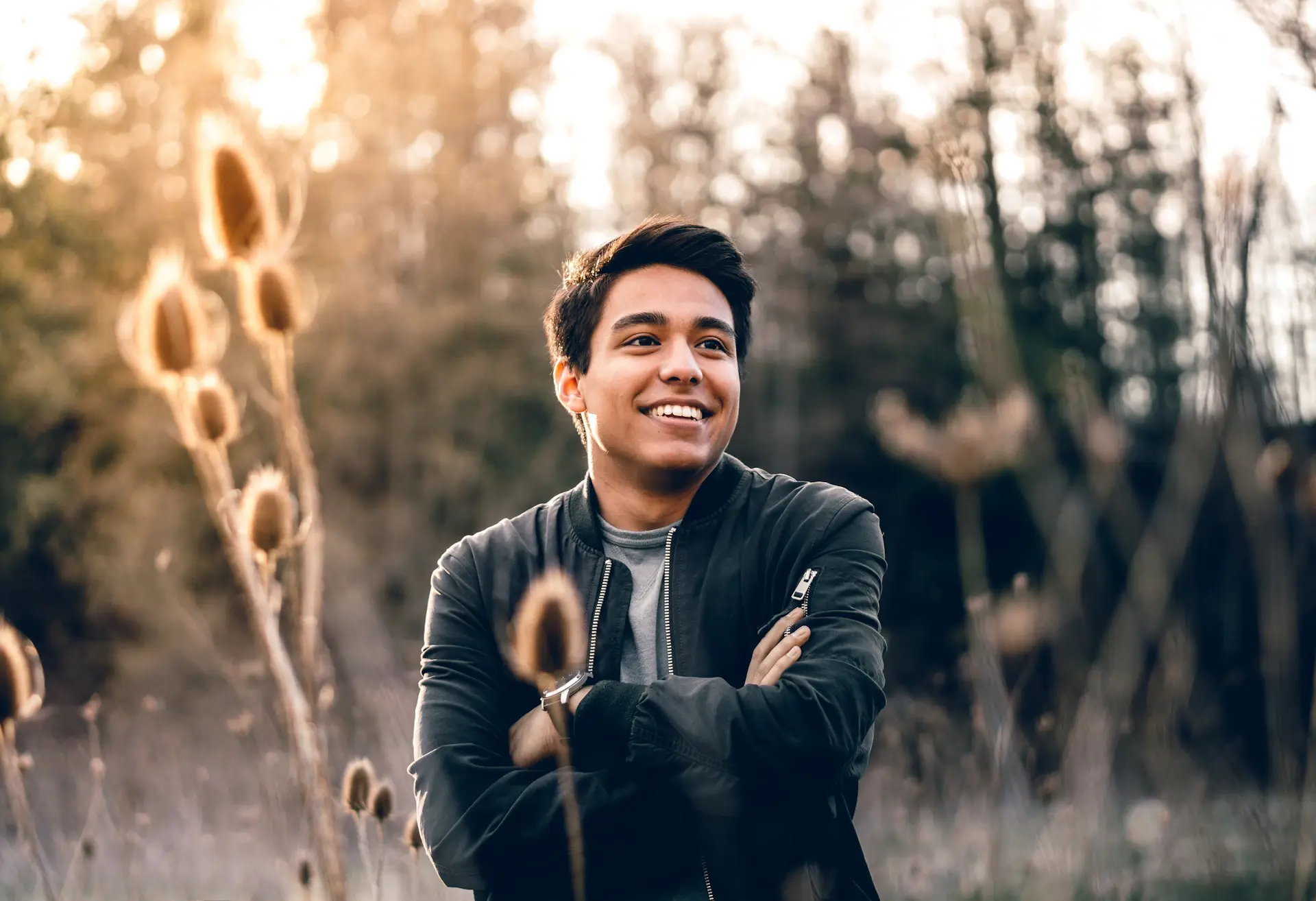 Relaxed student smiling in sunlight