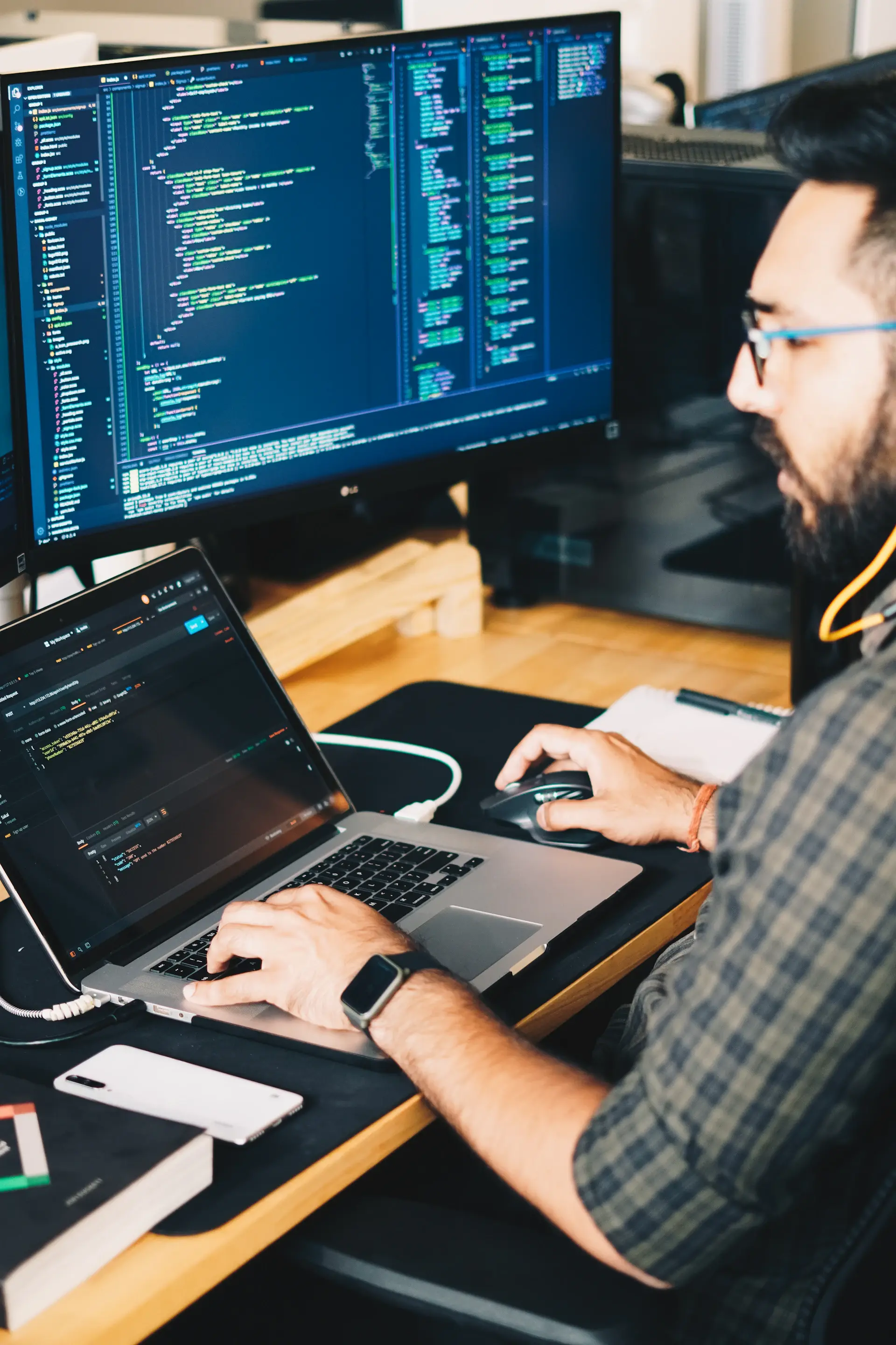 Developer pair programming at a desk