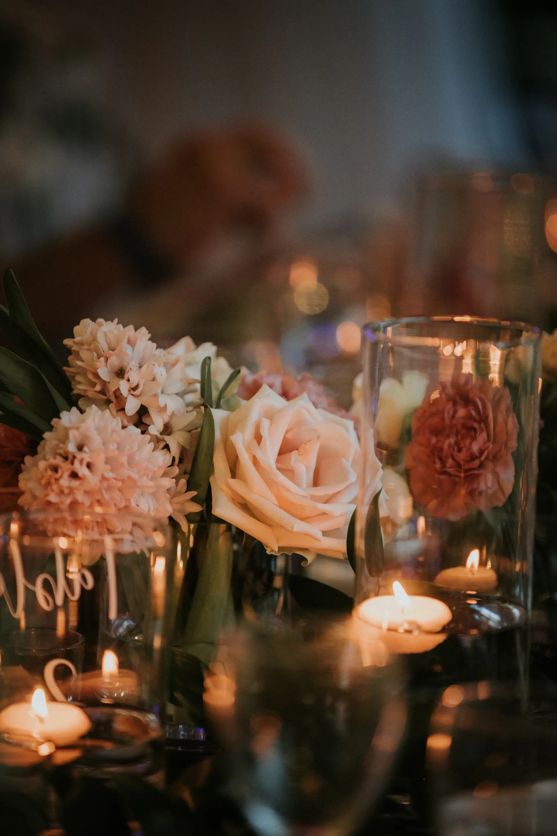 A reception room glowing with candlelight