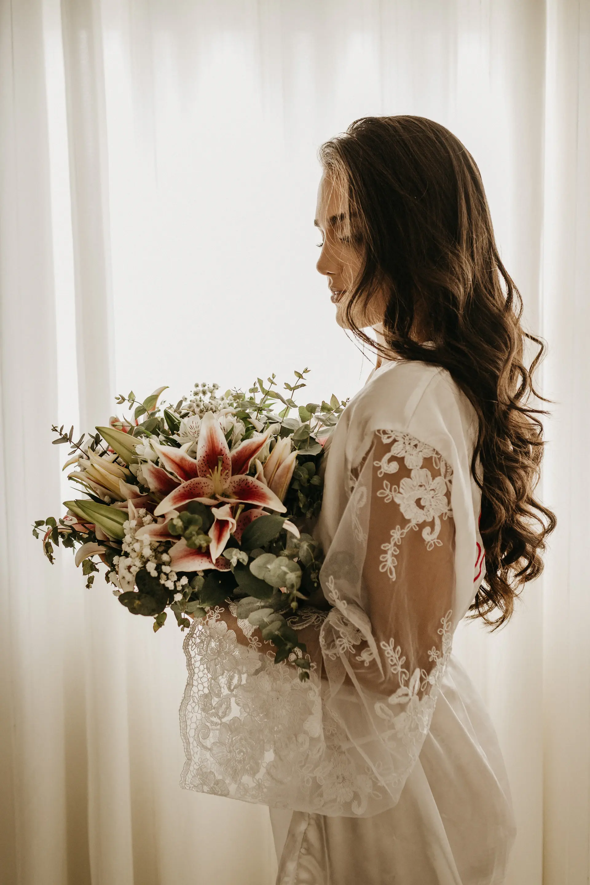 Bridal hair adorned with fresh blooms