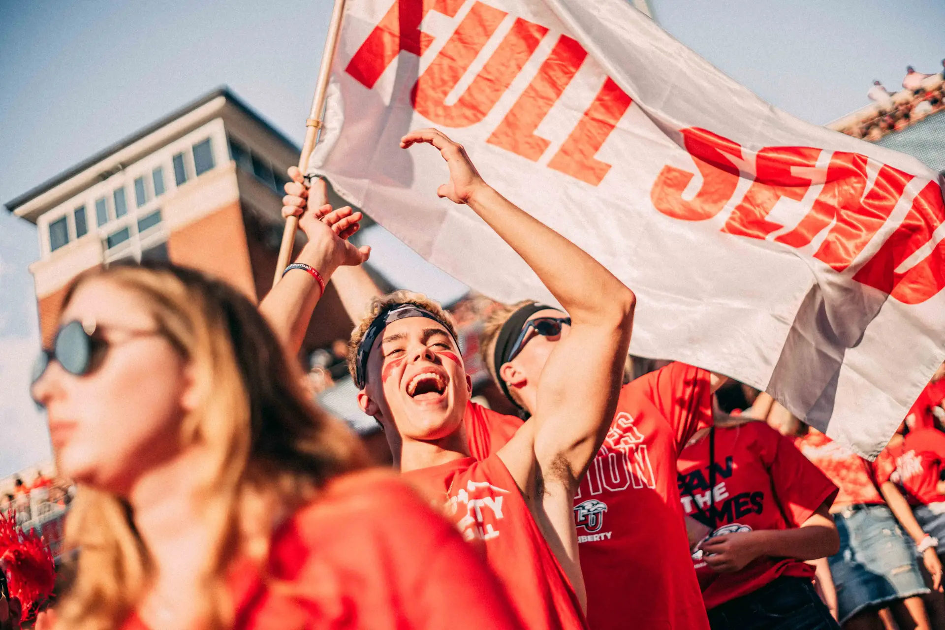 Students cheering at a university sports event