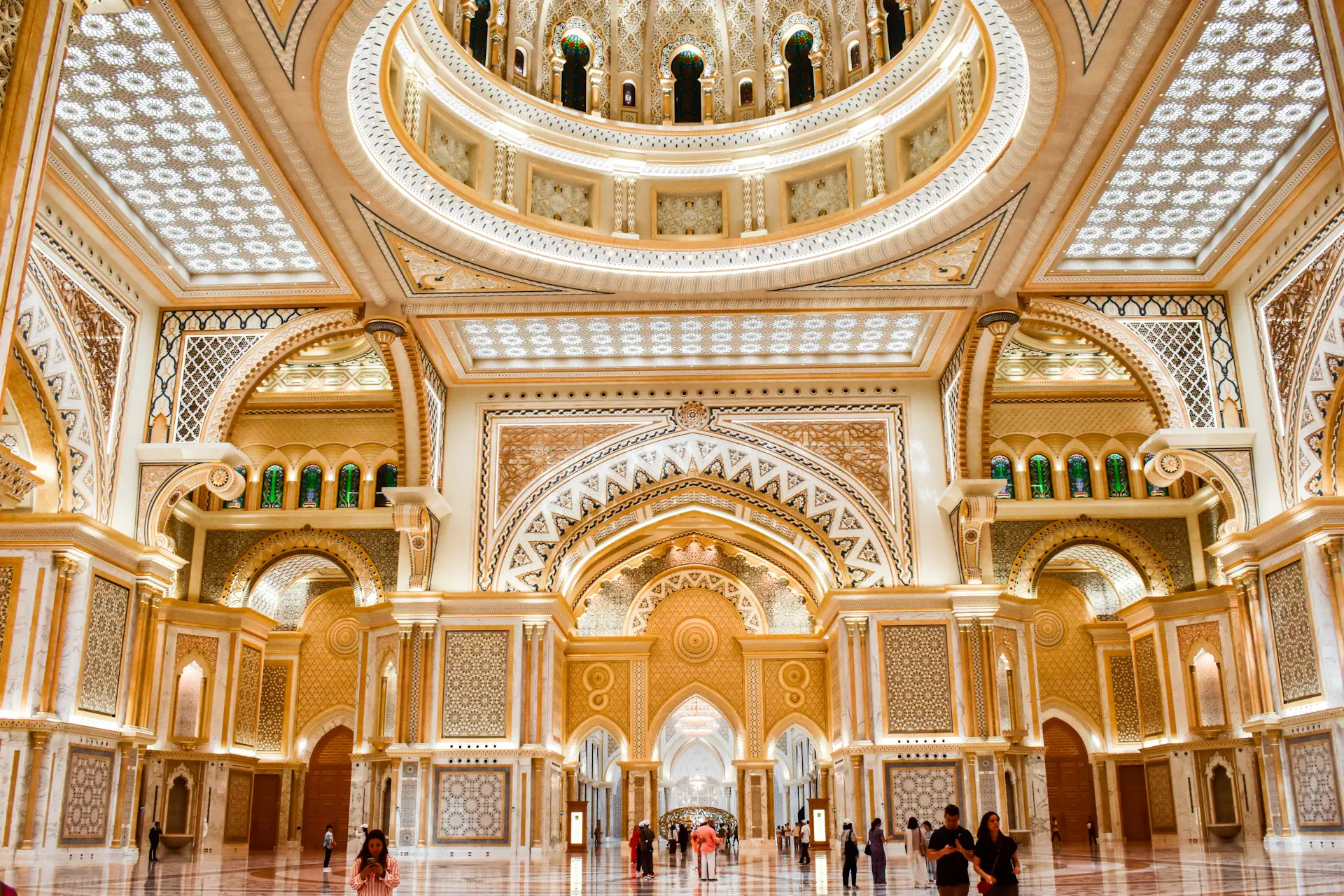 Sweeping panoramic view of an Aurielle palace ballroom at golden hour
