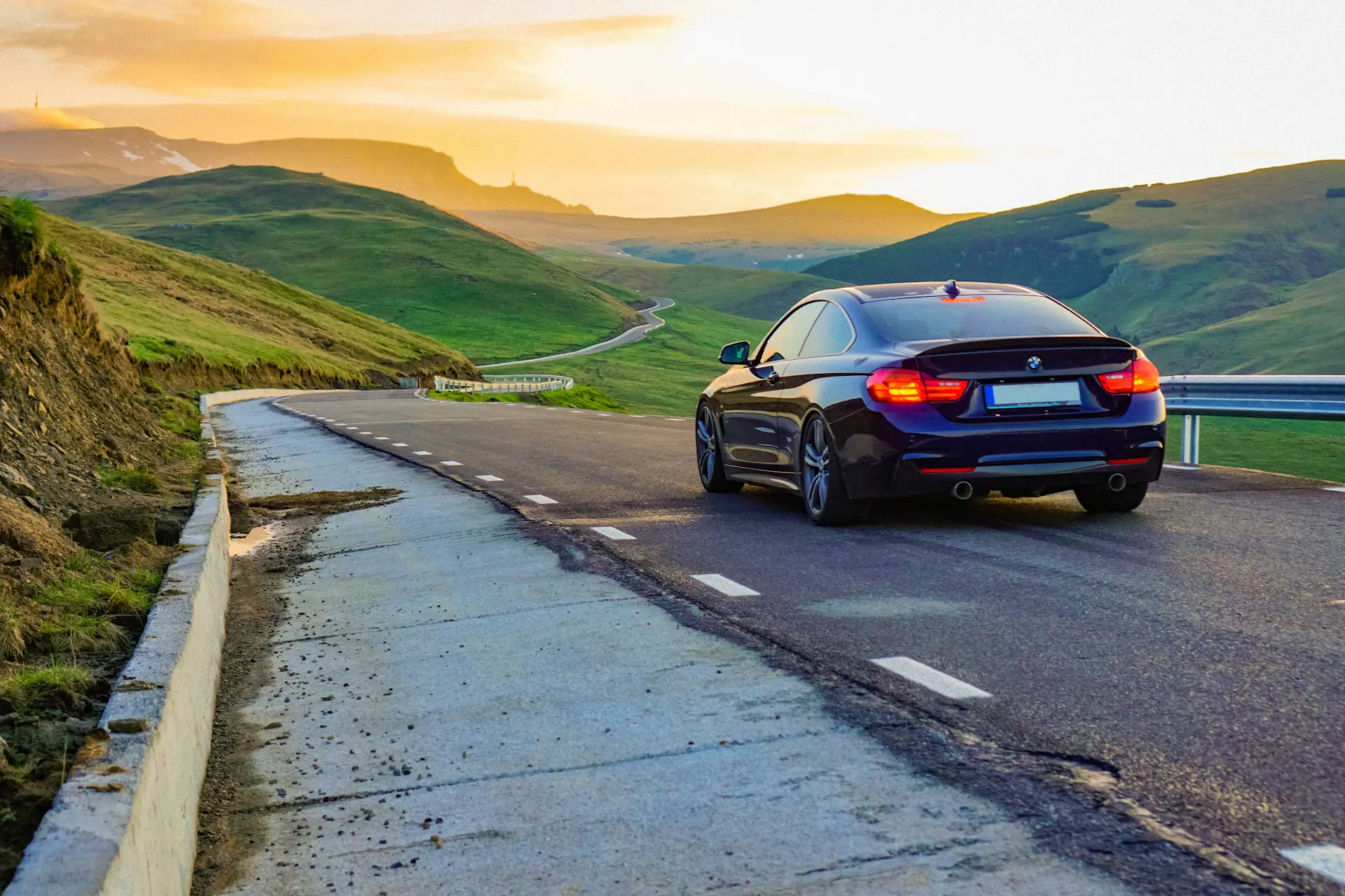 The Meridian GT on an open mountain road at dusk