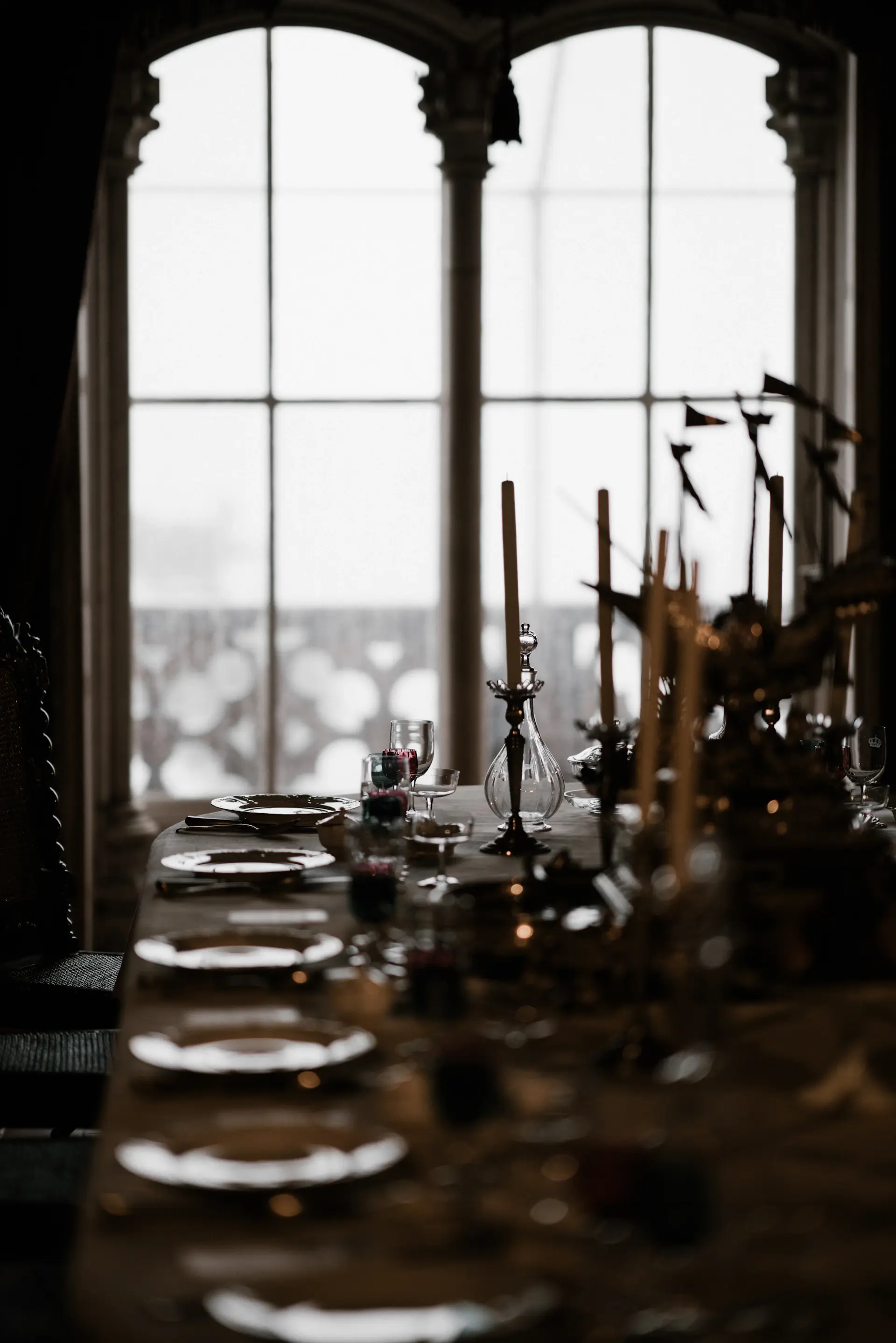 An intimate dinner set against a window full of polar light