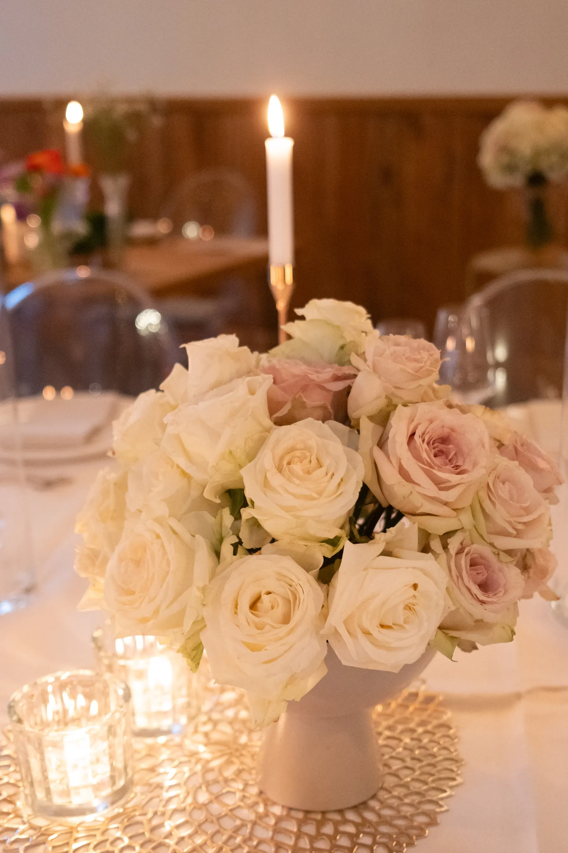 Tablescape of roses and candlelight