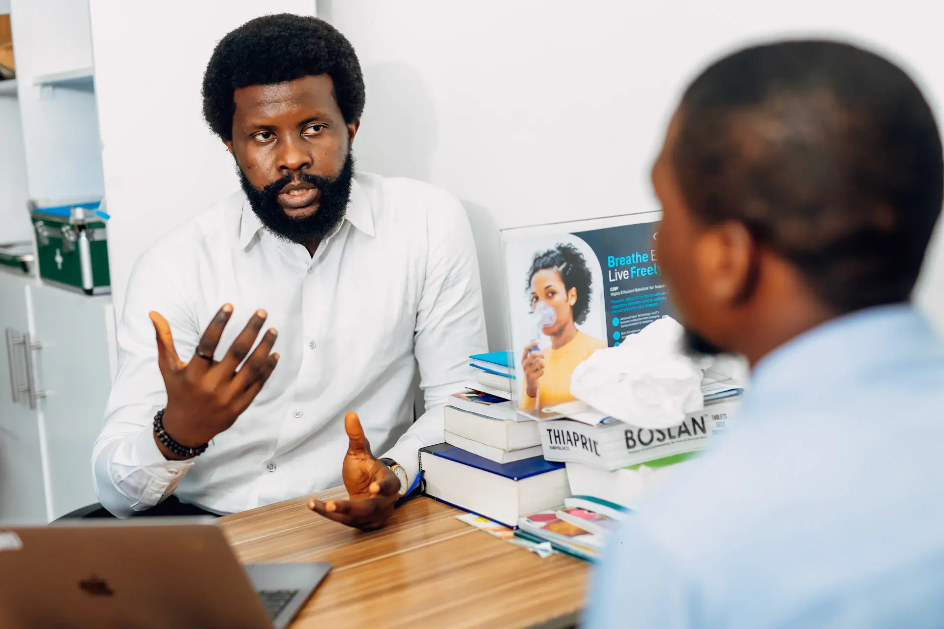 Elite Pathways advisors meeting with a student and parents in a refined consultation room