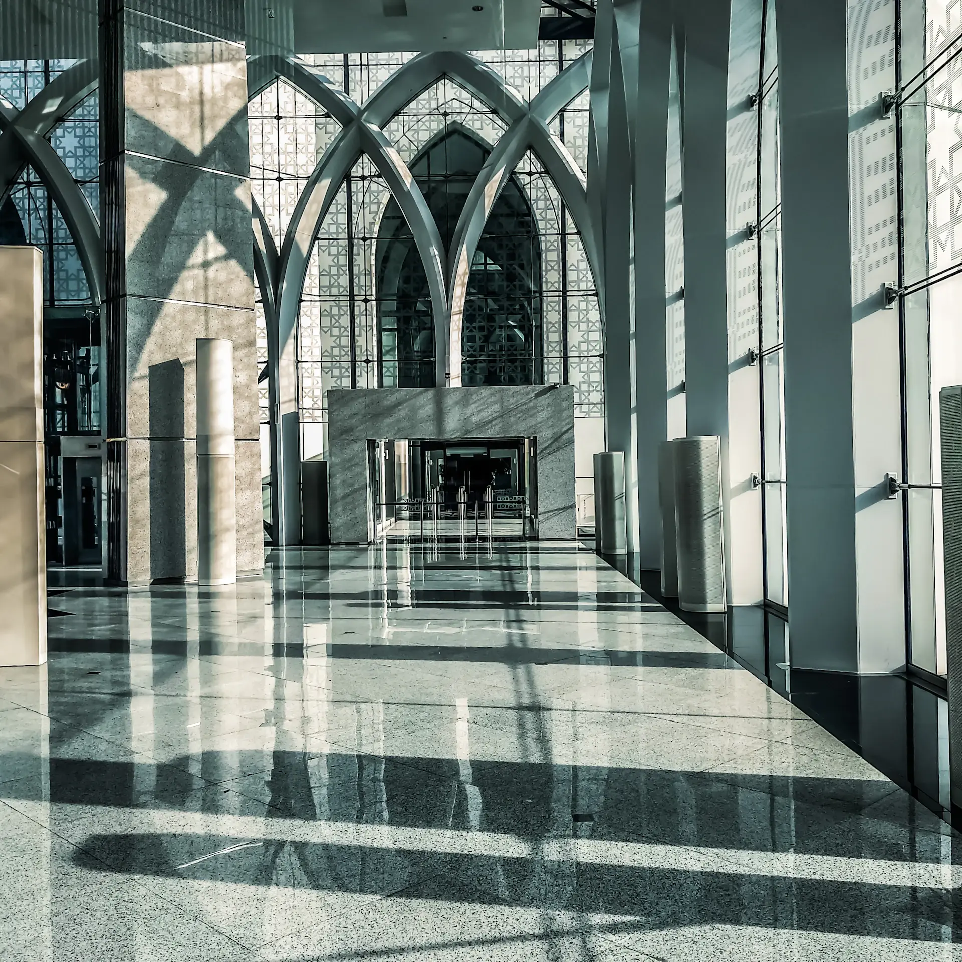 Sunlit marble atrium of the clinic