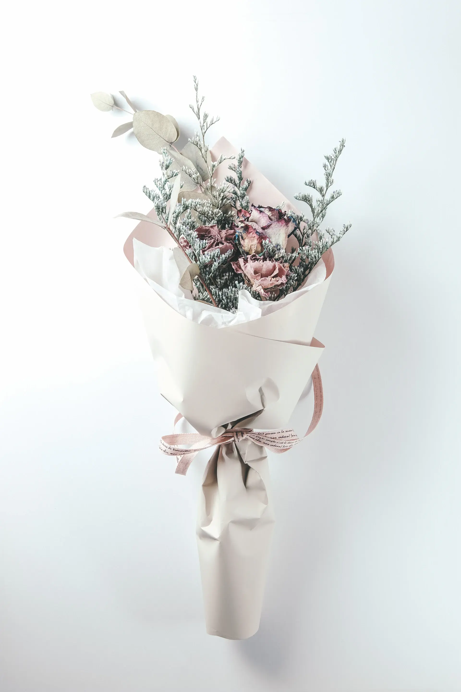 A rose bouquet tied with silk ribbon