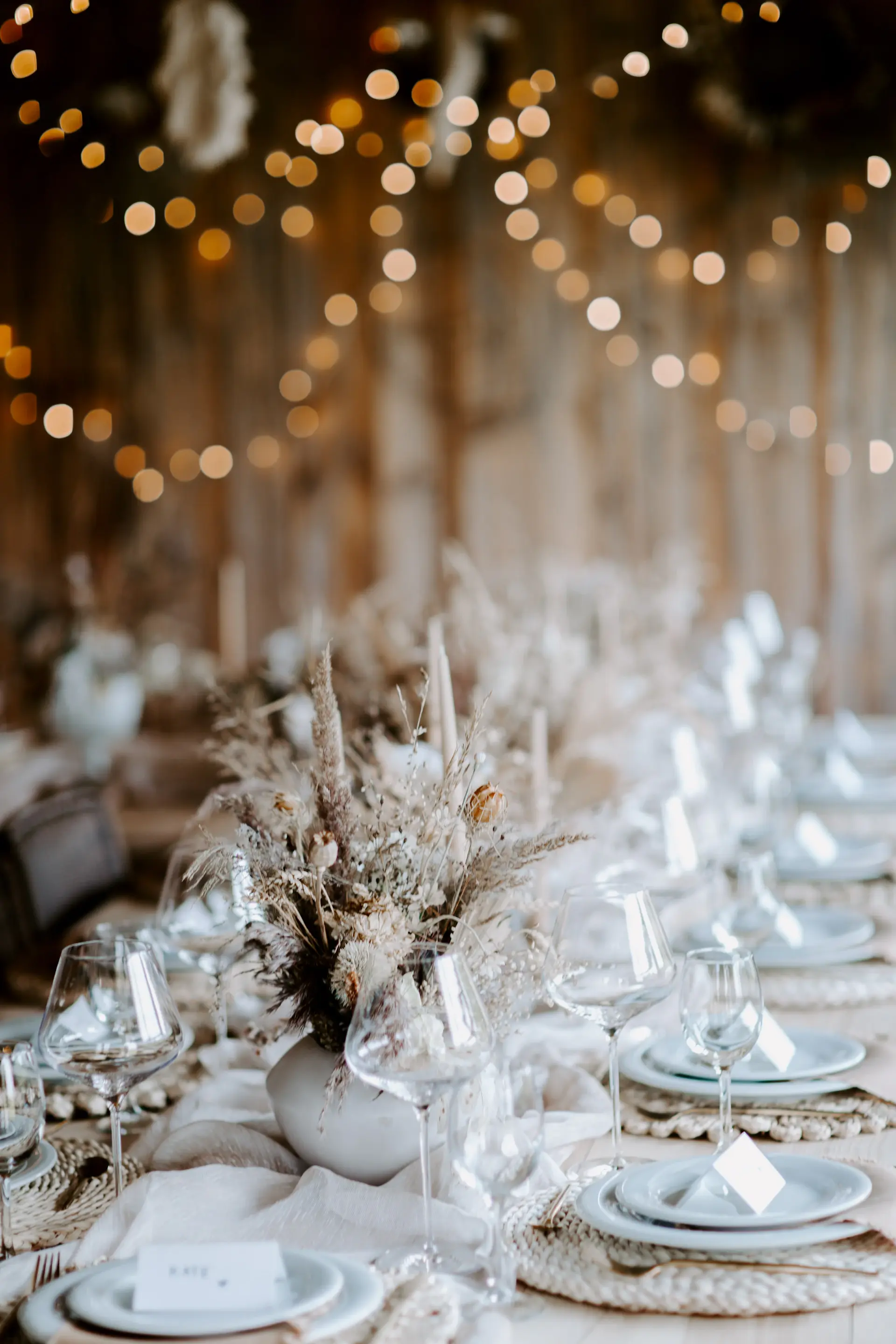 A soft ivory and champagne wedding tablescape