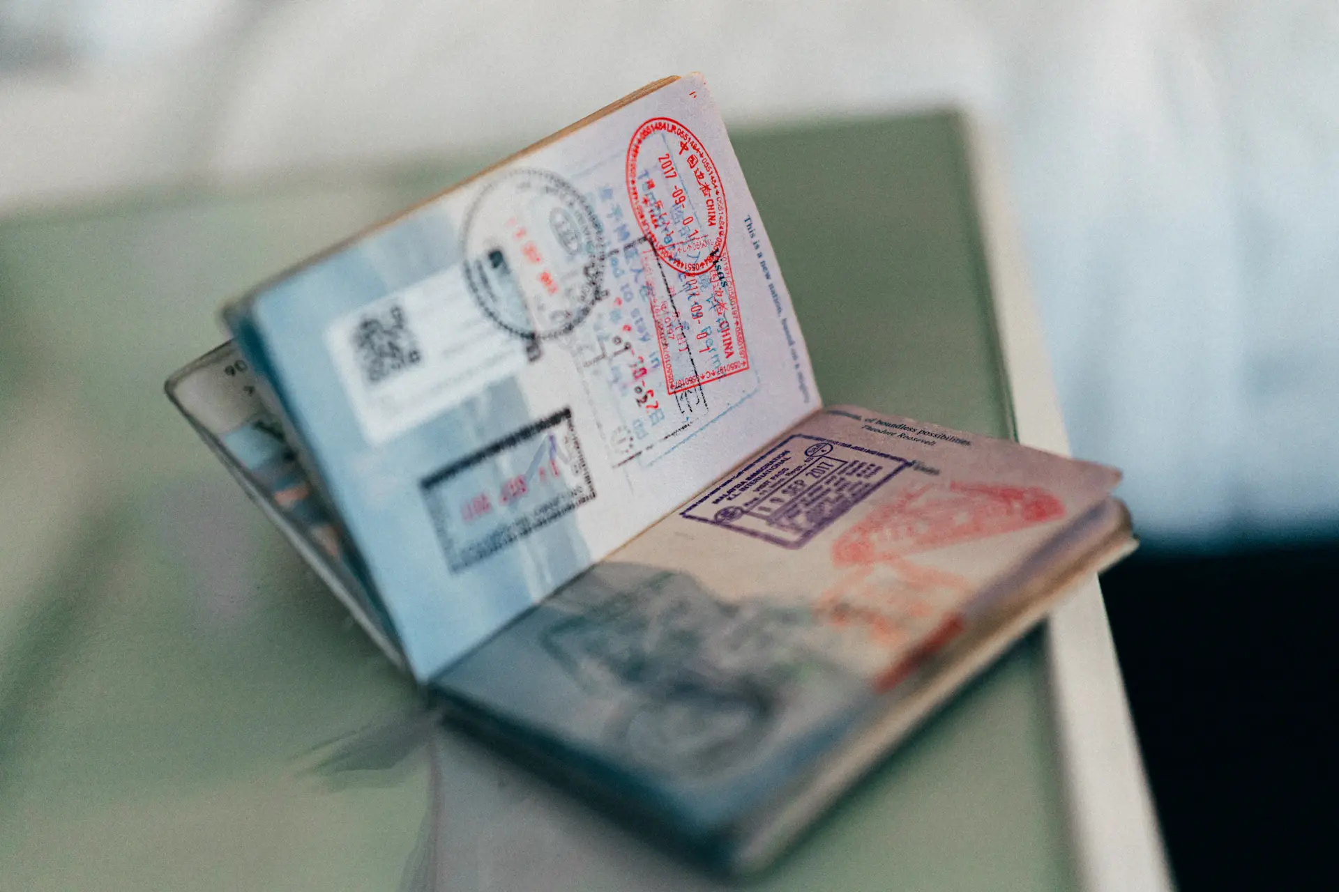 Passport and visa application on a desk