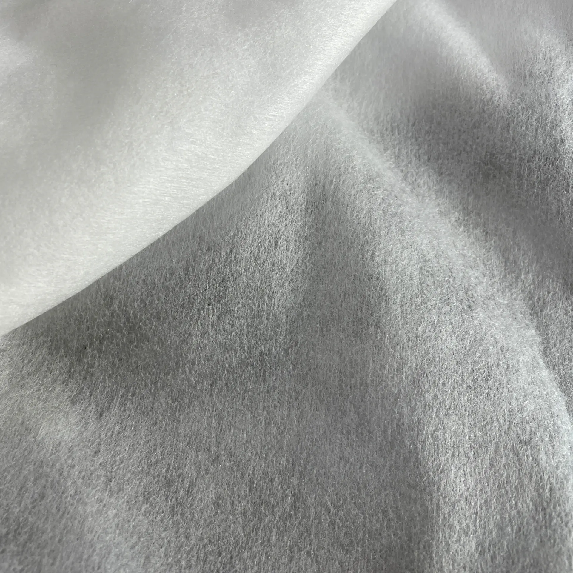Macro of soft ivory cashmere headliner fabric
