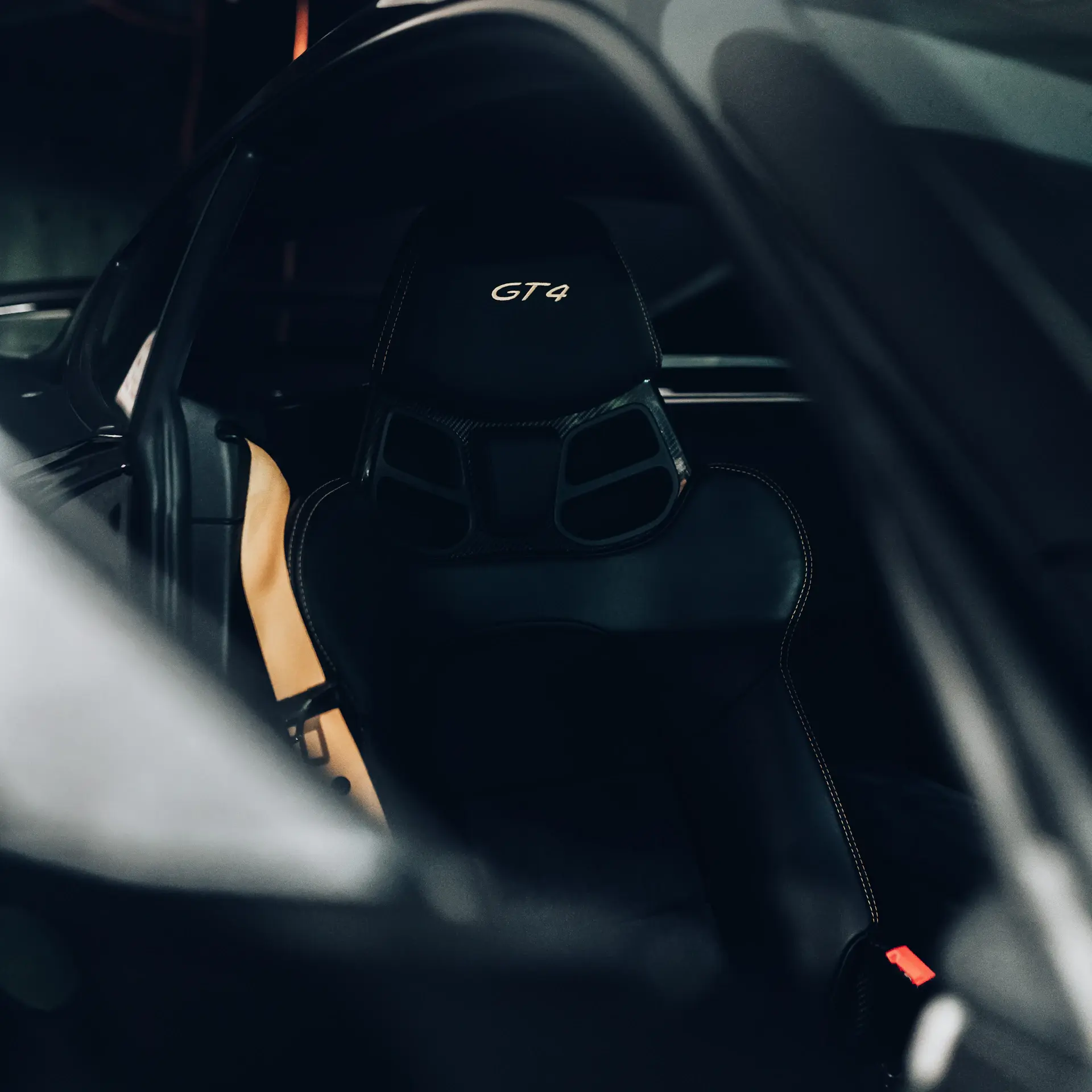 Embroidered owner's monogram on a hand-stitched leather headrest