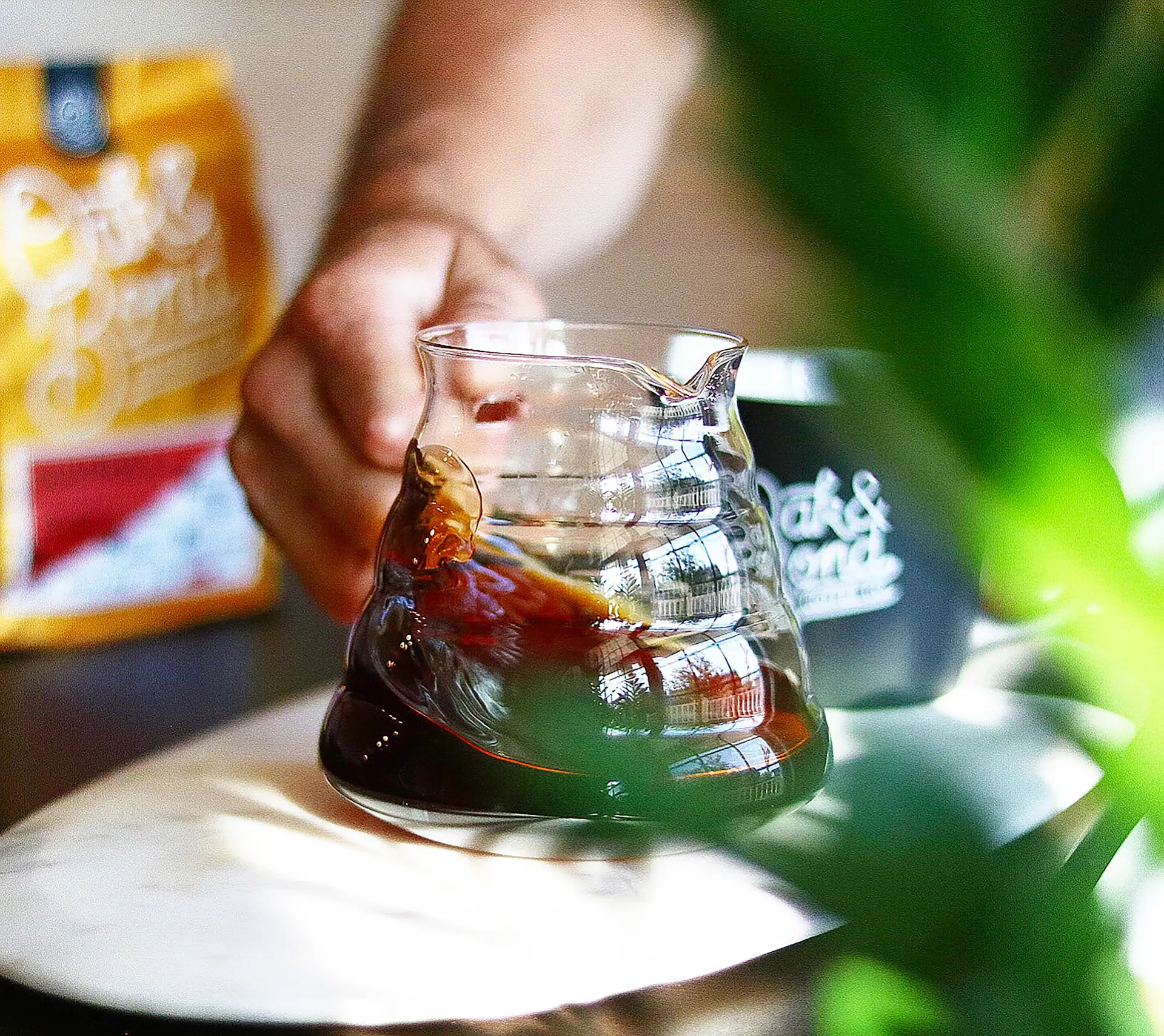Pour over coffee dripping into a glass server