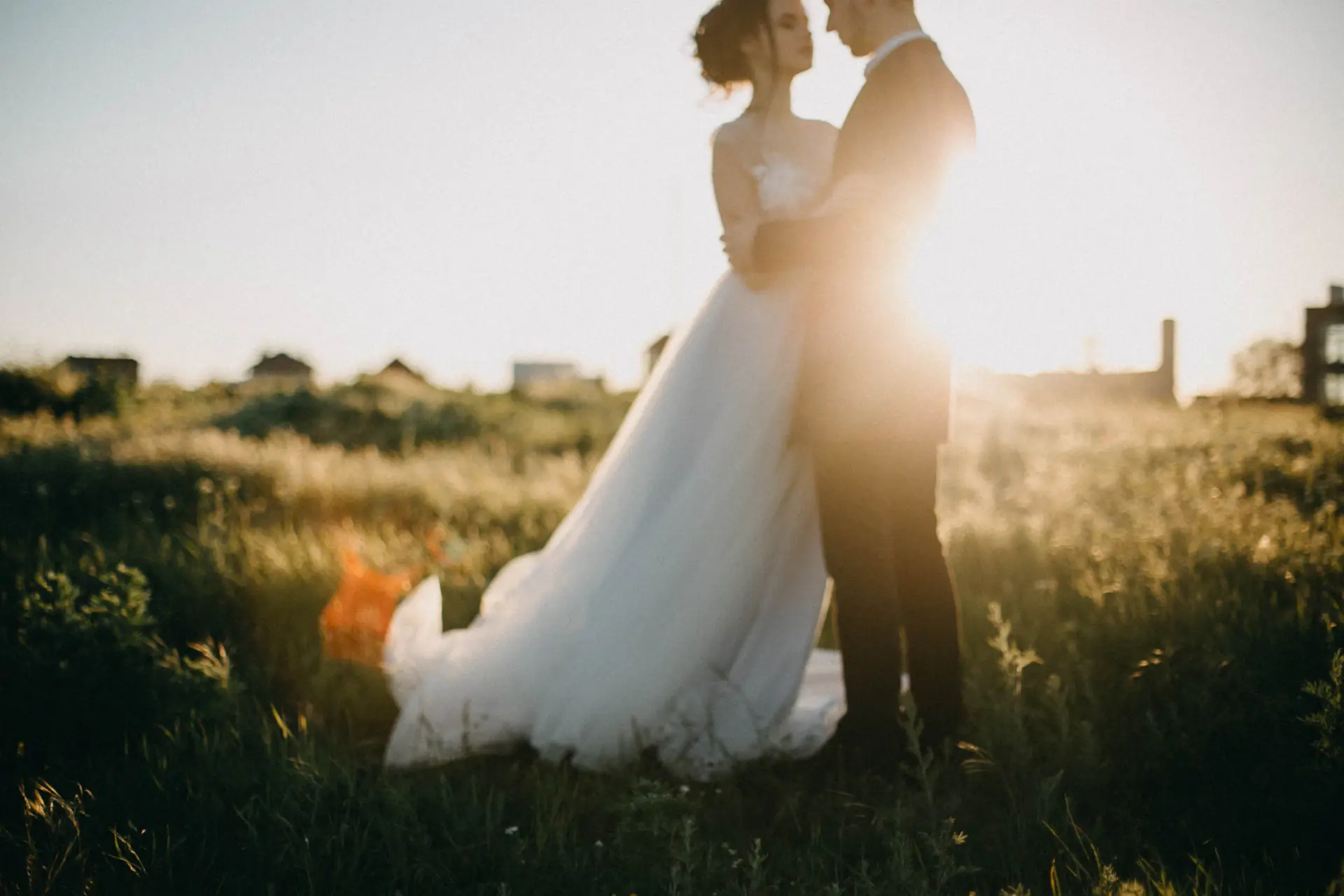 Couple embracing at golden hour