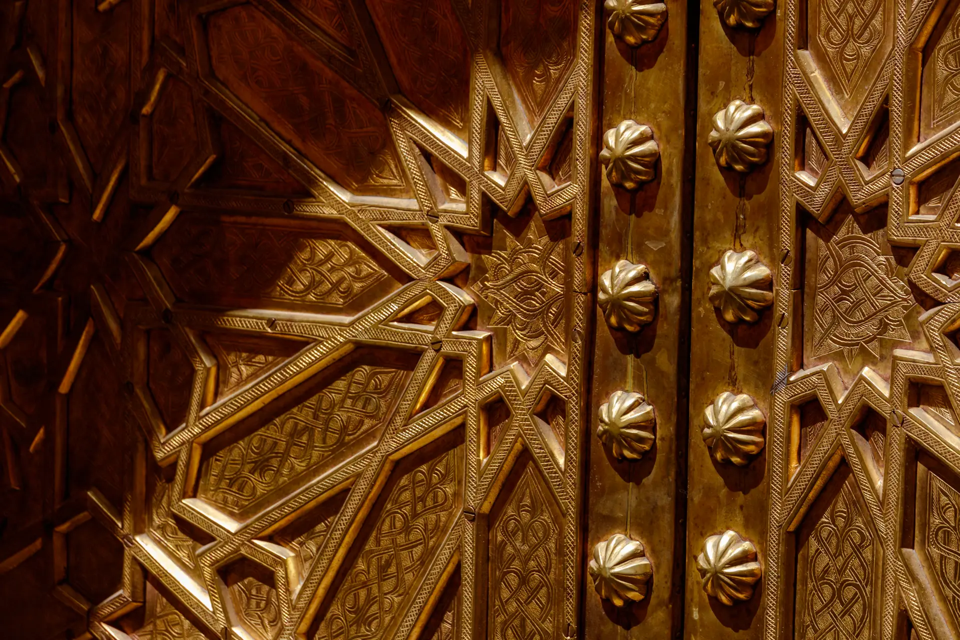 An engraved brass plaque on the door of the house