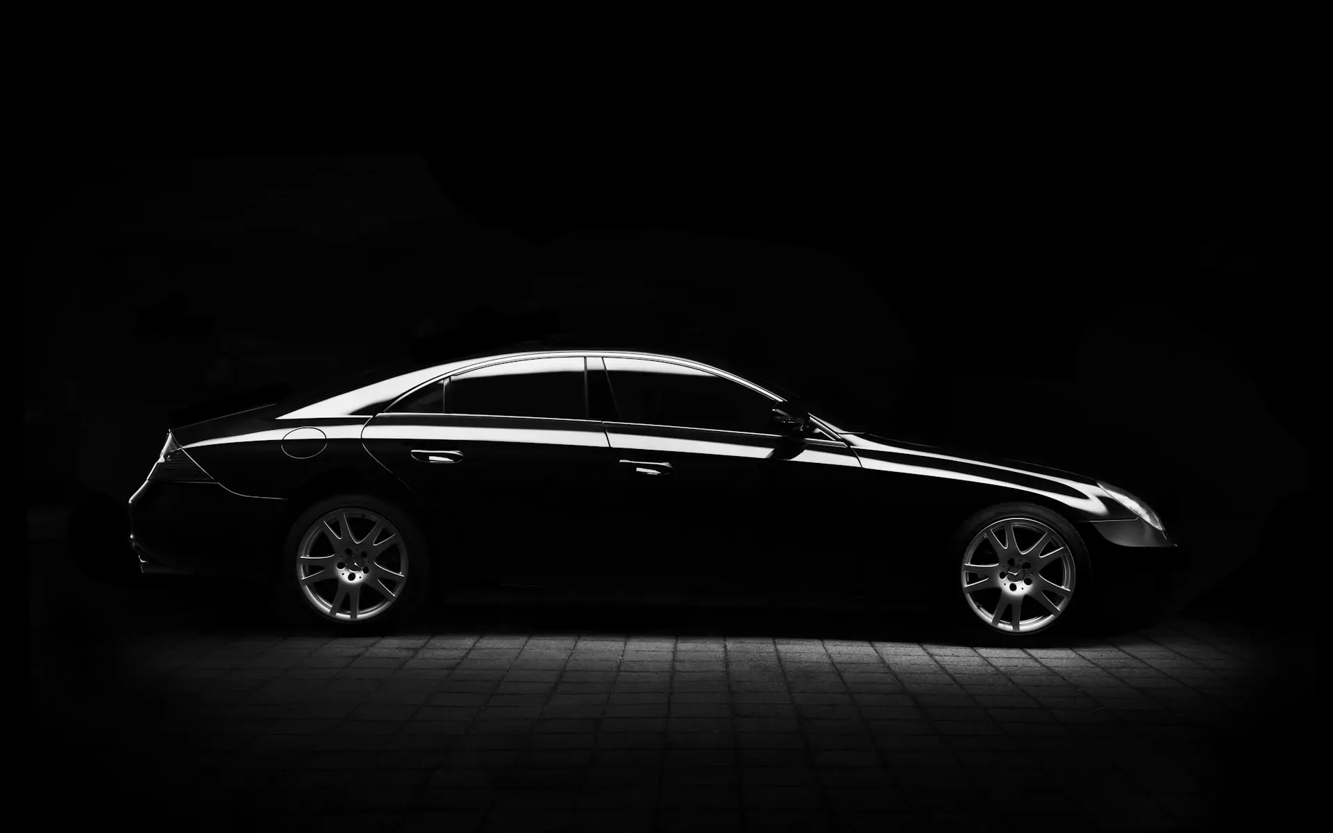 The Phantom Coupé in profile under low light
