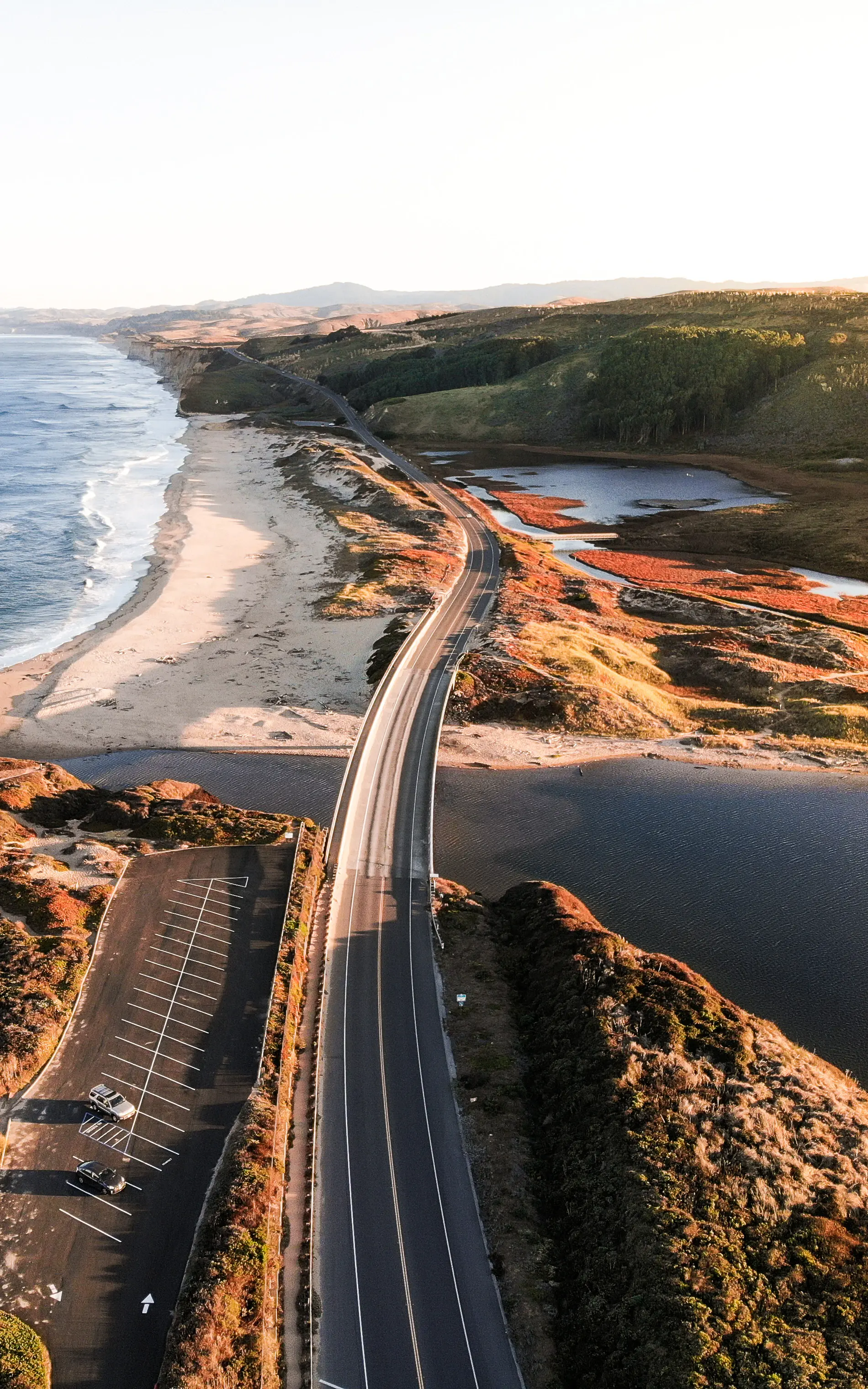 A motorcar on the Pacific Coast Highway along the California coastline