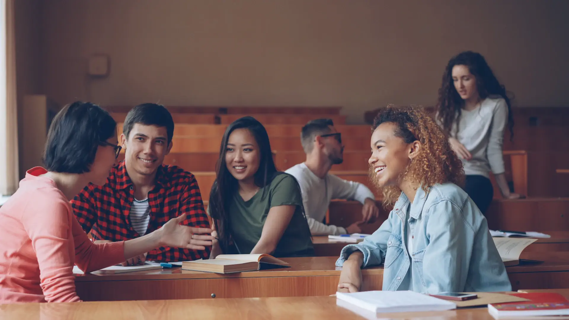 Students collaborating in a bright American campus library