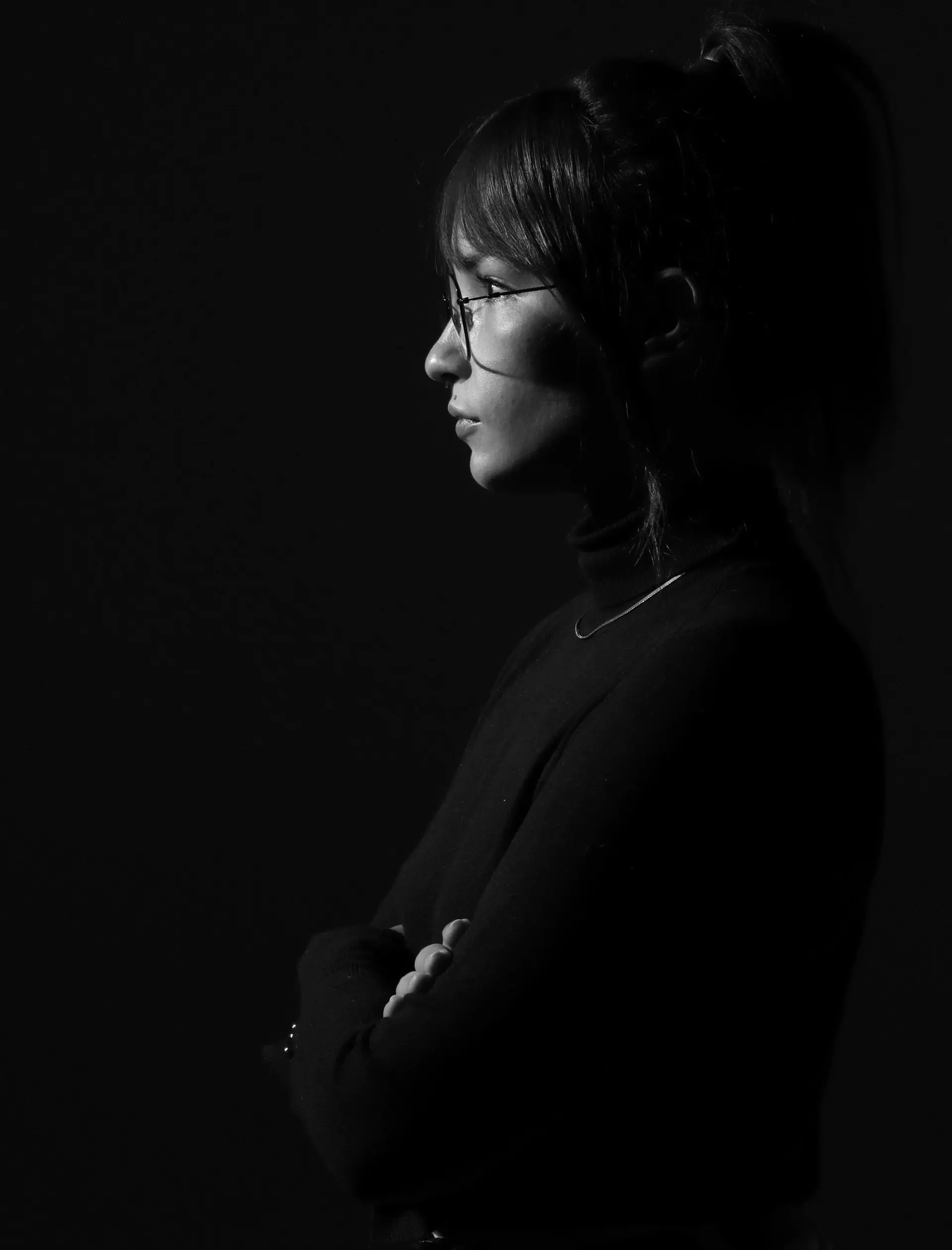 A discreet monochrome portrait of an owner