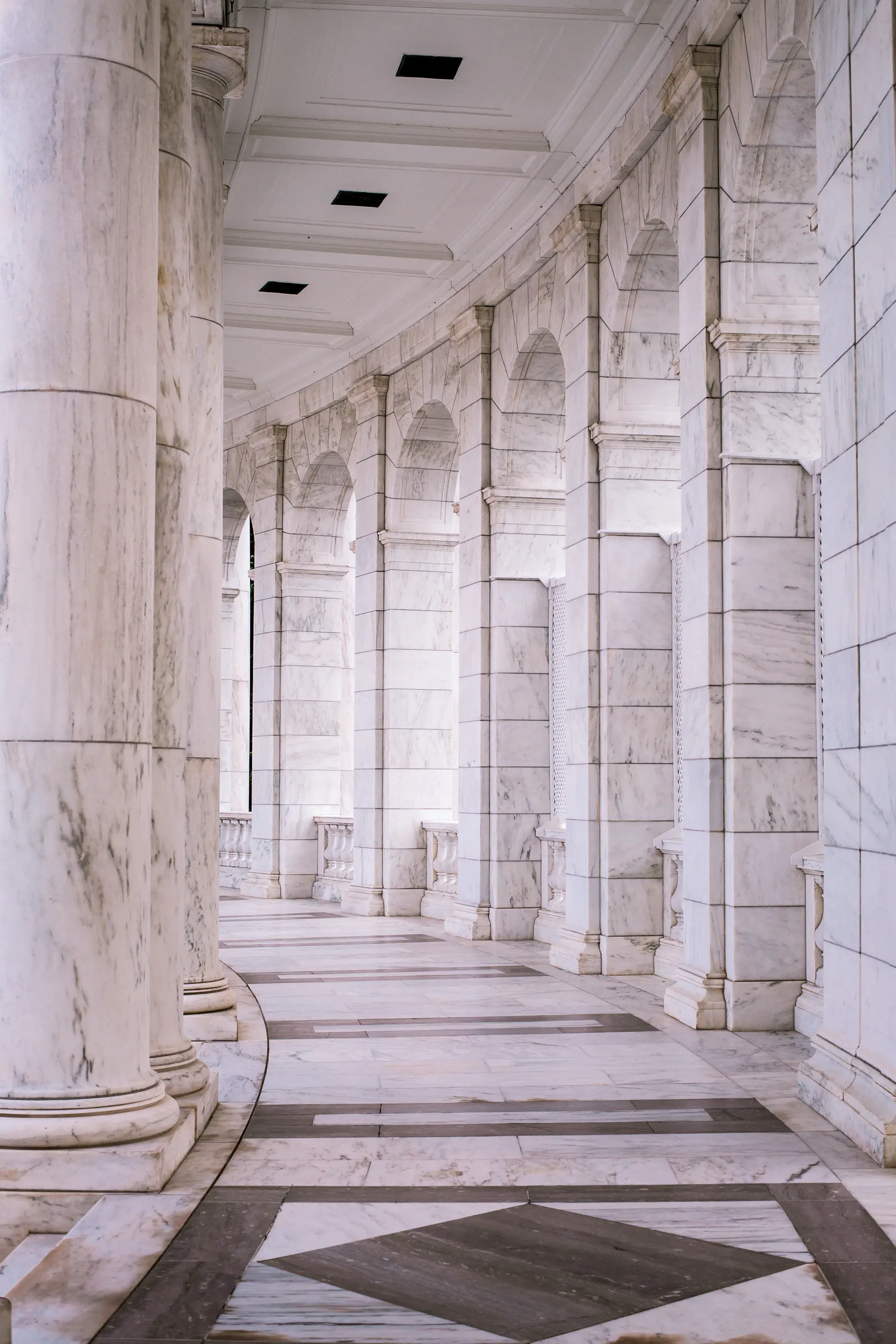 Cordelia and Theodore beneath the marble atrium
