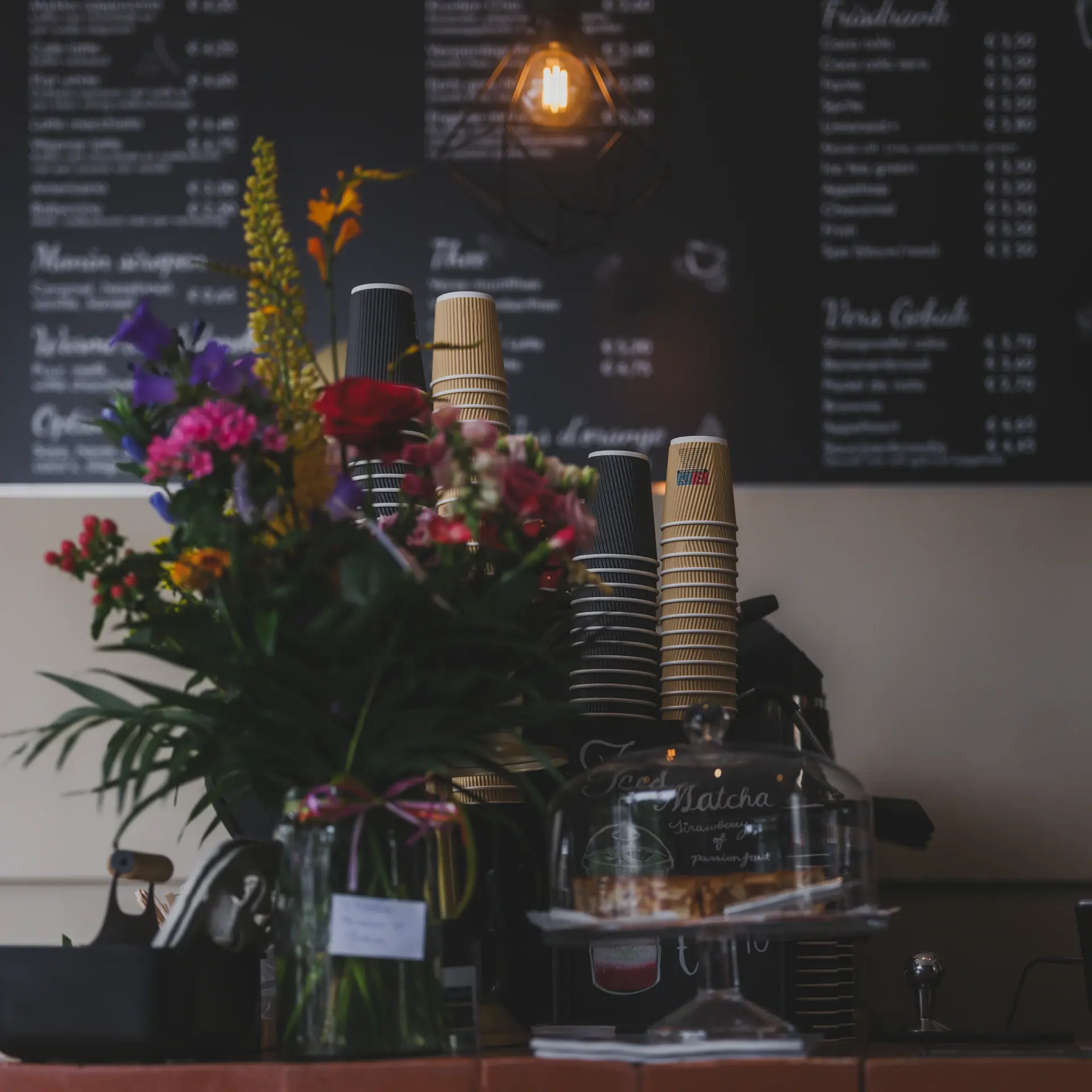 Coffee bar topped with tropical foliage