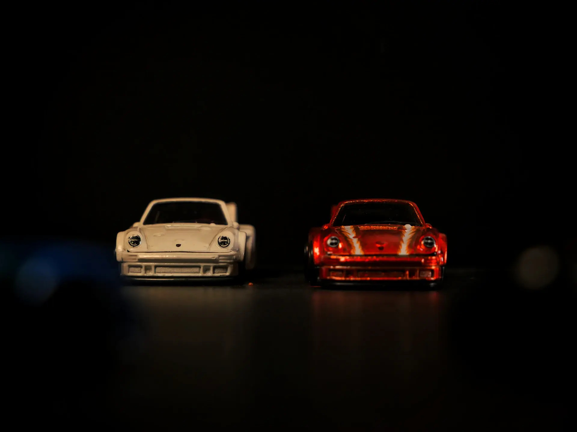 The Phantom Coupé in profile against a dark studio backdrop