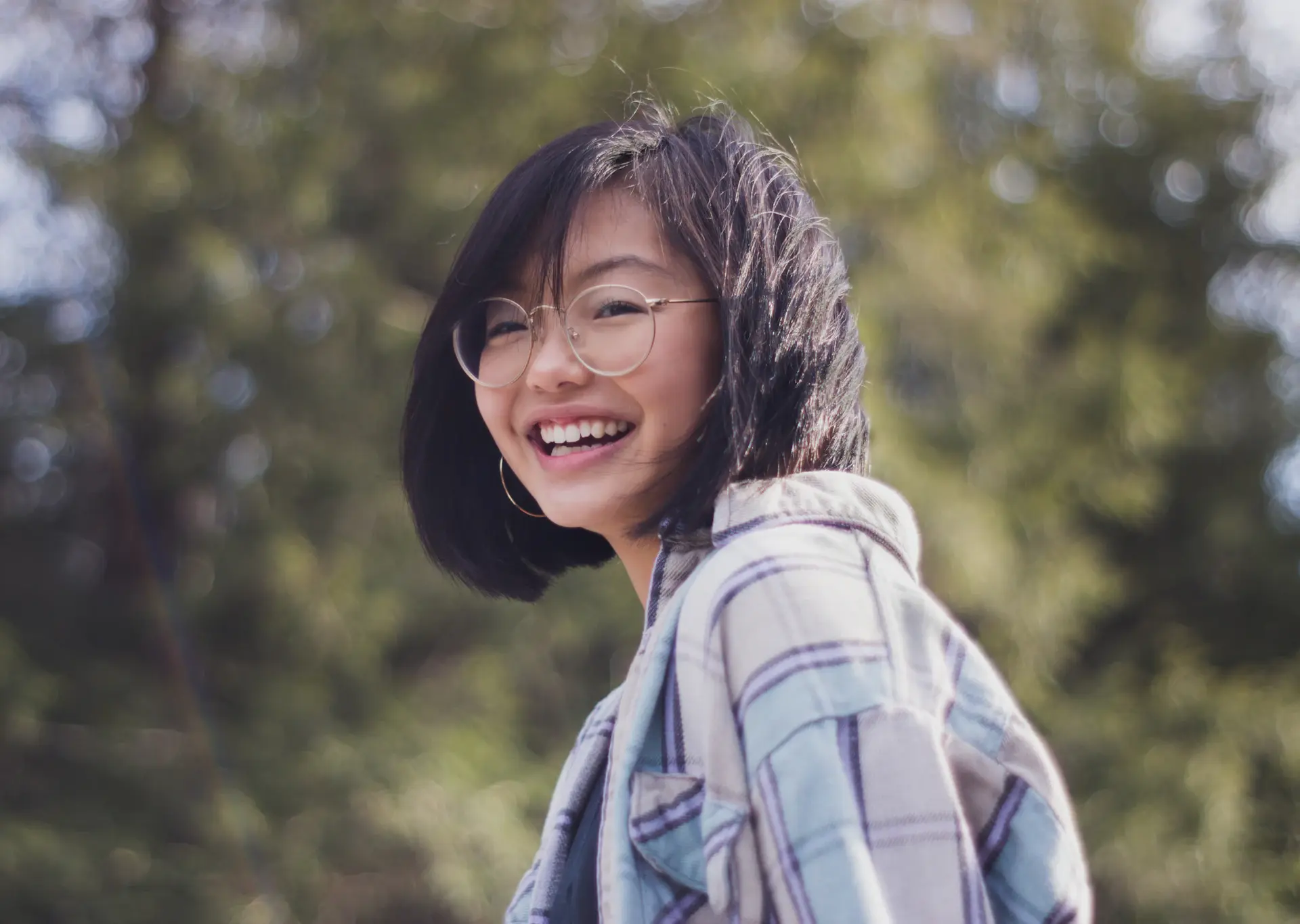 International student smiling outdoors