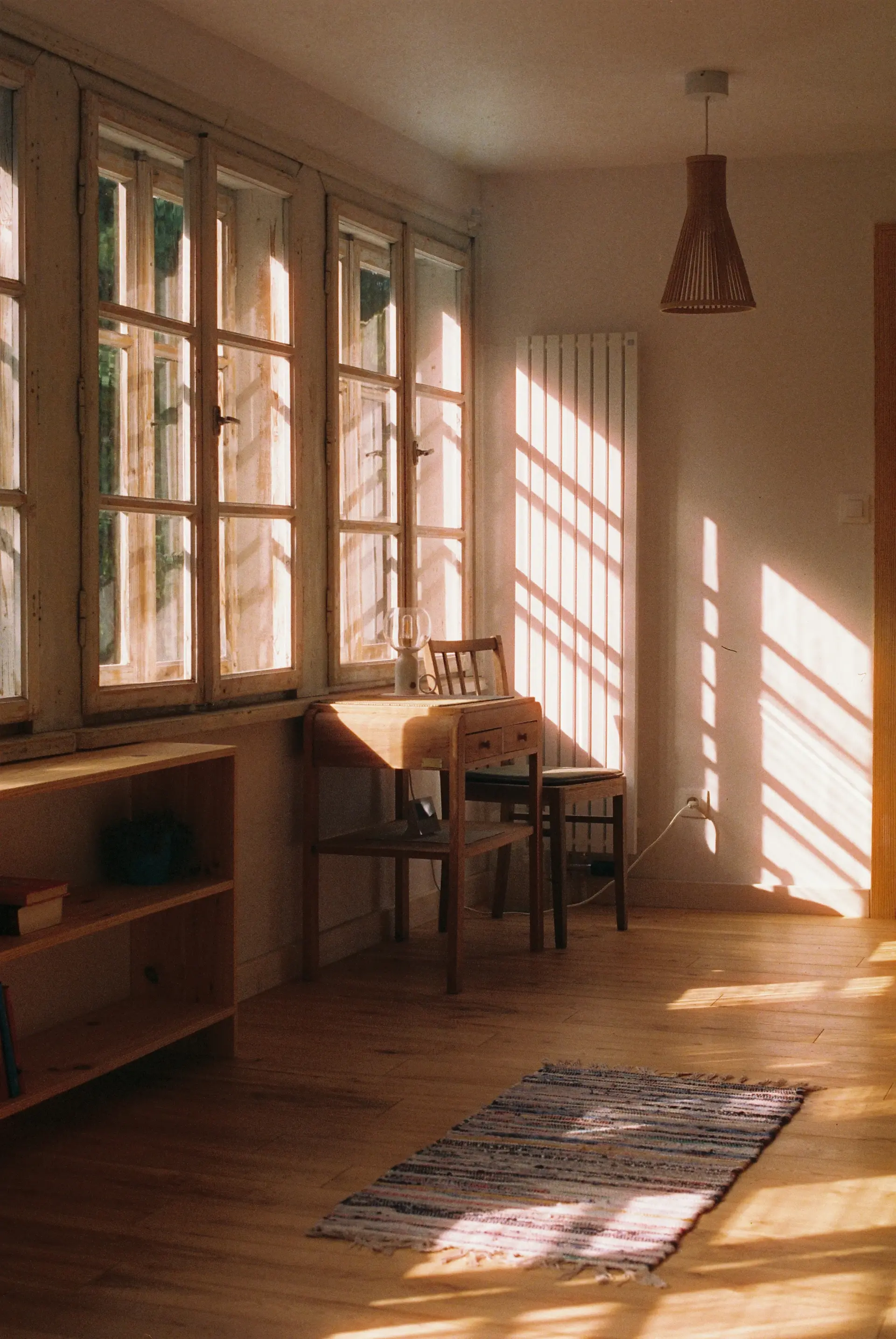 Restored mews house with bi-fold doors opening to a courtyard