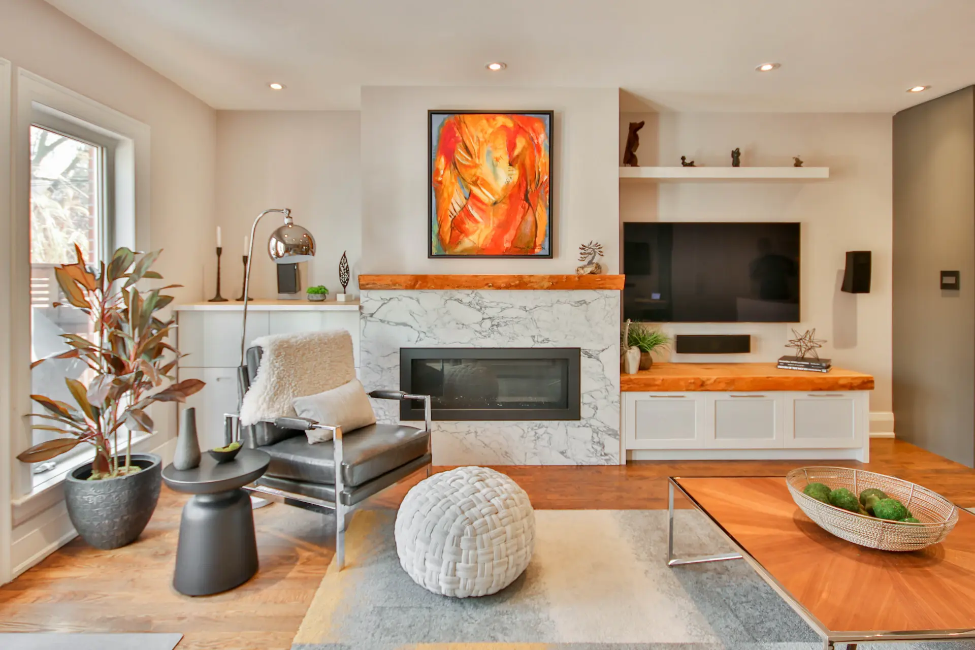 A collector's living room with a large contemporary painting