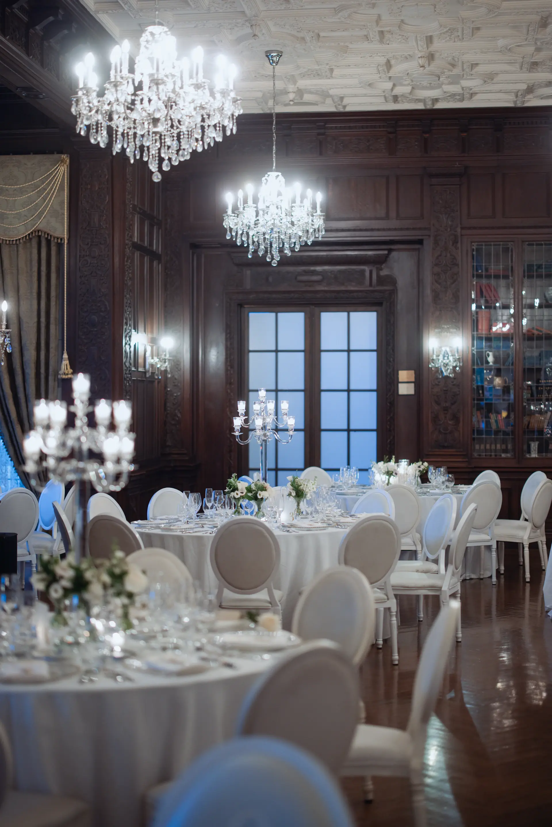 The Crystal Hall with glass walls and golden light