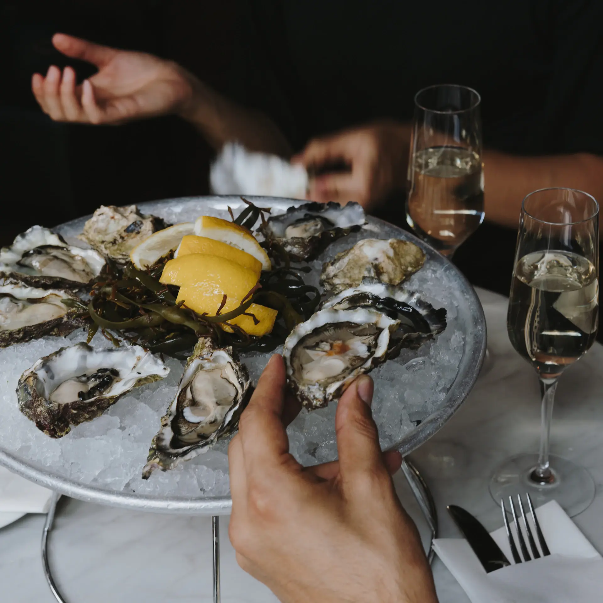 Platter of fresh oysters on ice