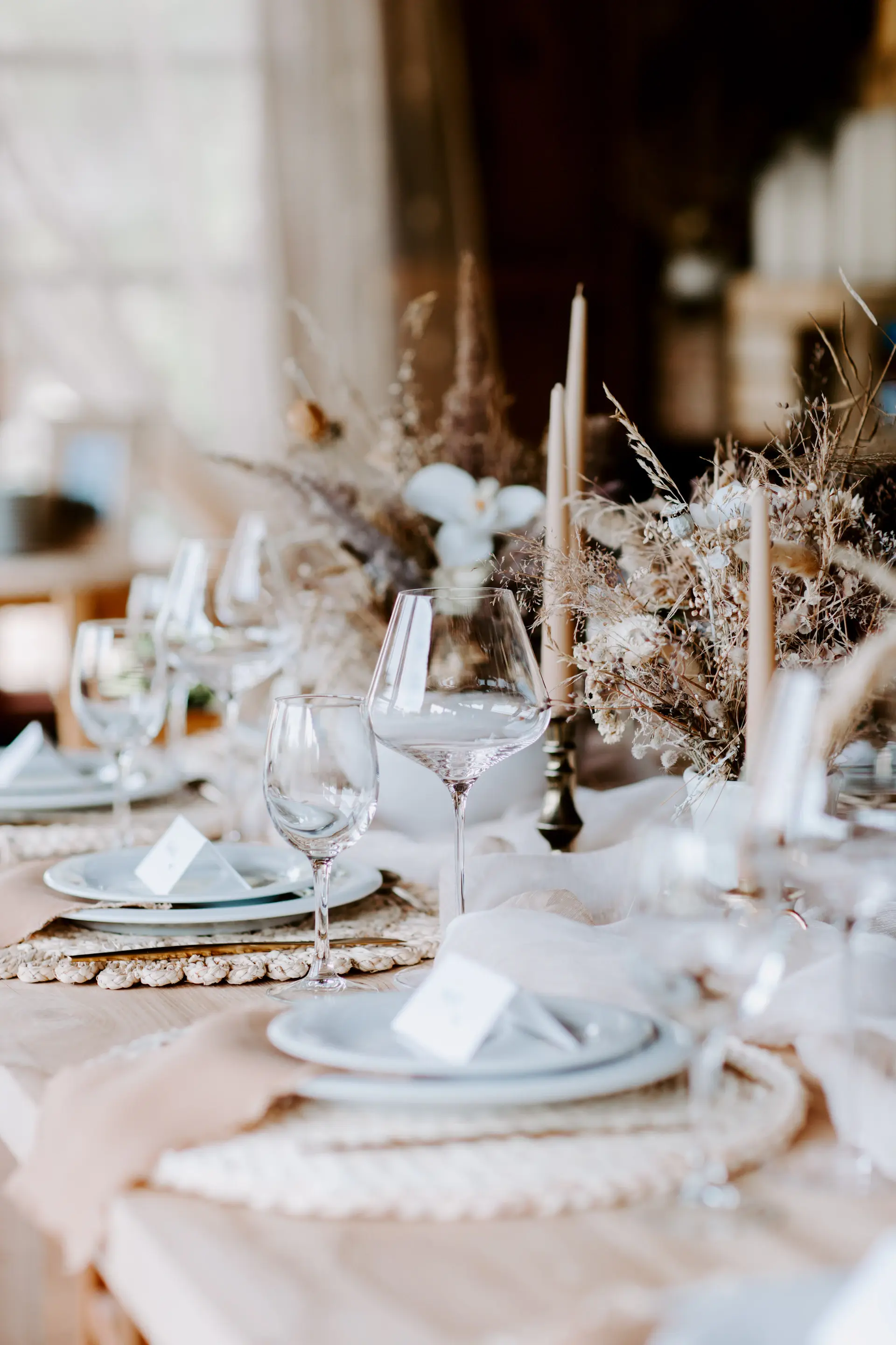 A soft ivory and champagne wedding tablescape