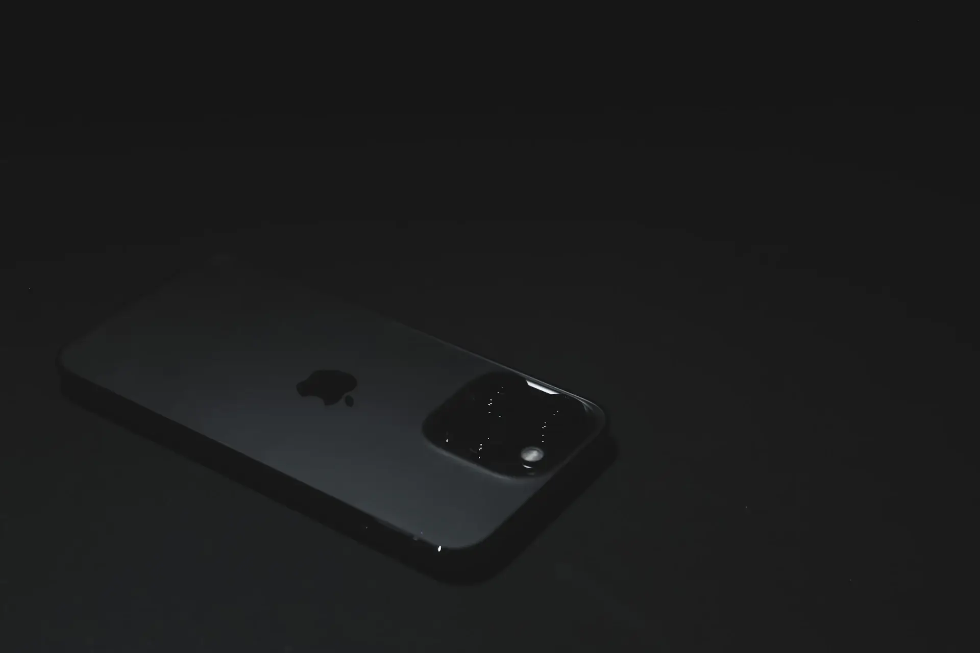 iPhone 18 Pro hero photograph against a dark backdrop