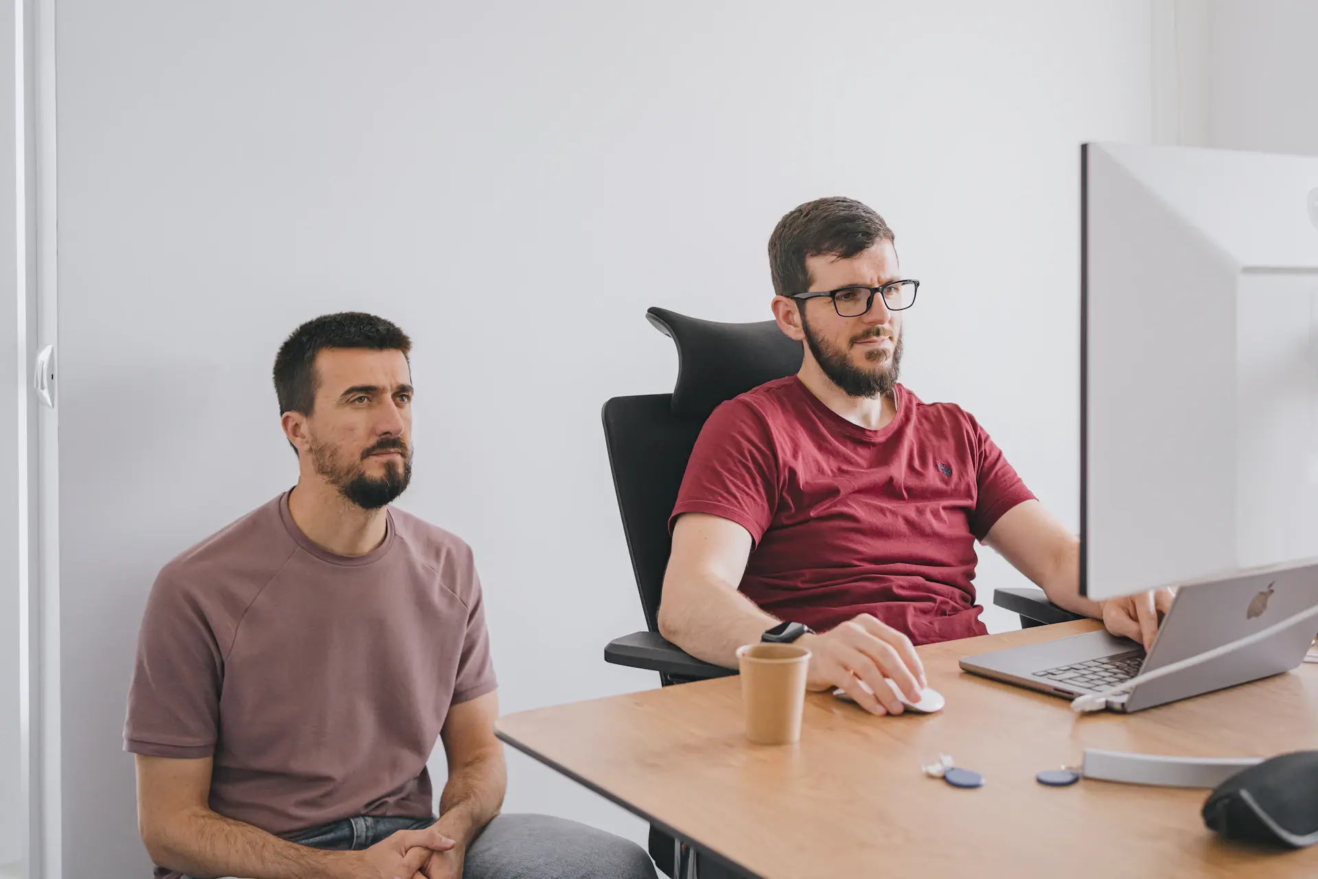 Founders talking in a small office