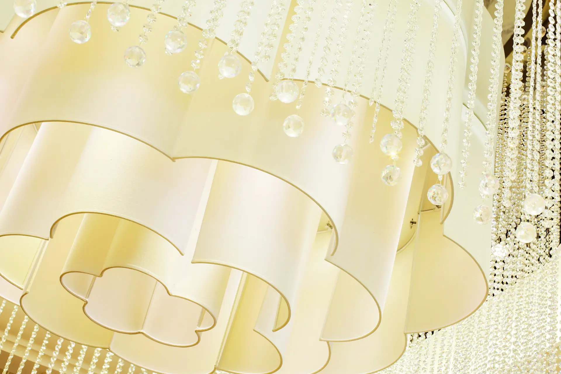 A grand mirrored ballroom crowned with crystal chandeliers