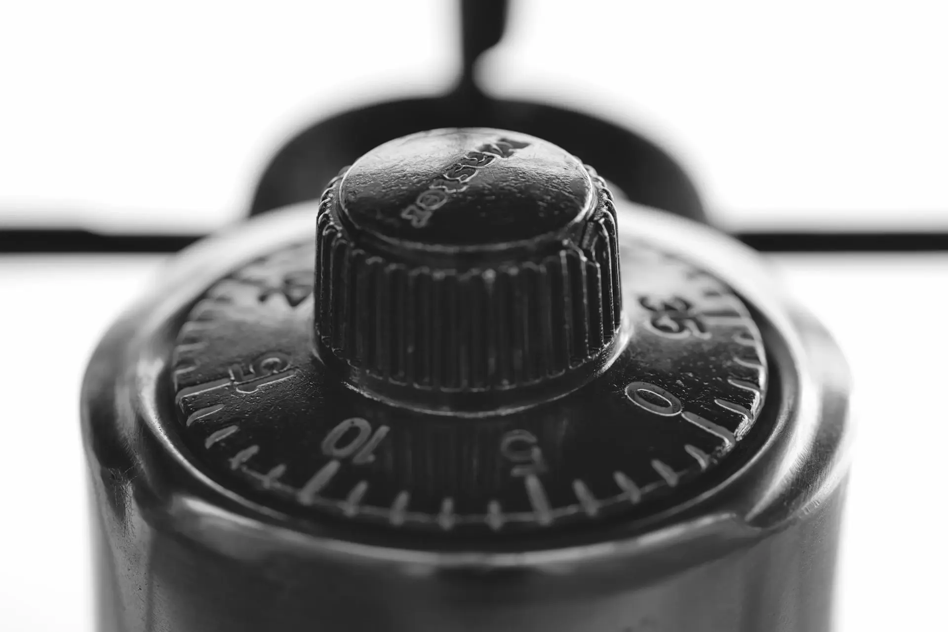 Close detail of a knurled metal control dial