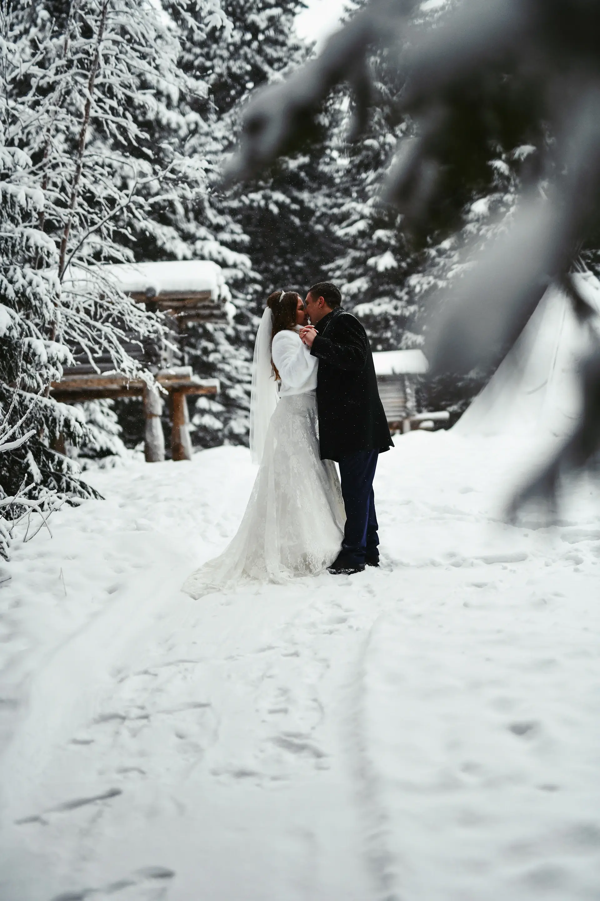 An intimate winter ceremony in a softly lit chapel