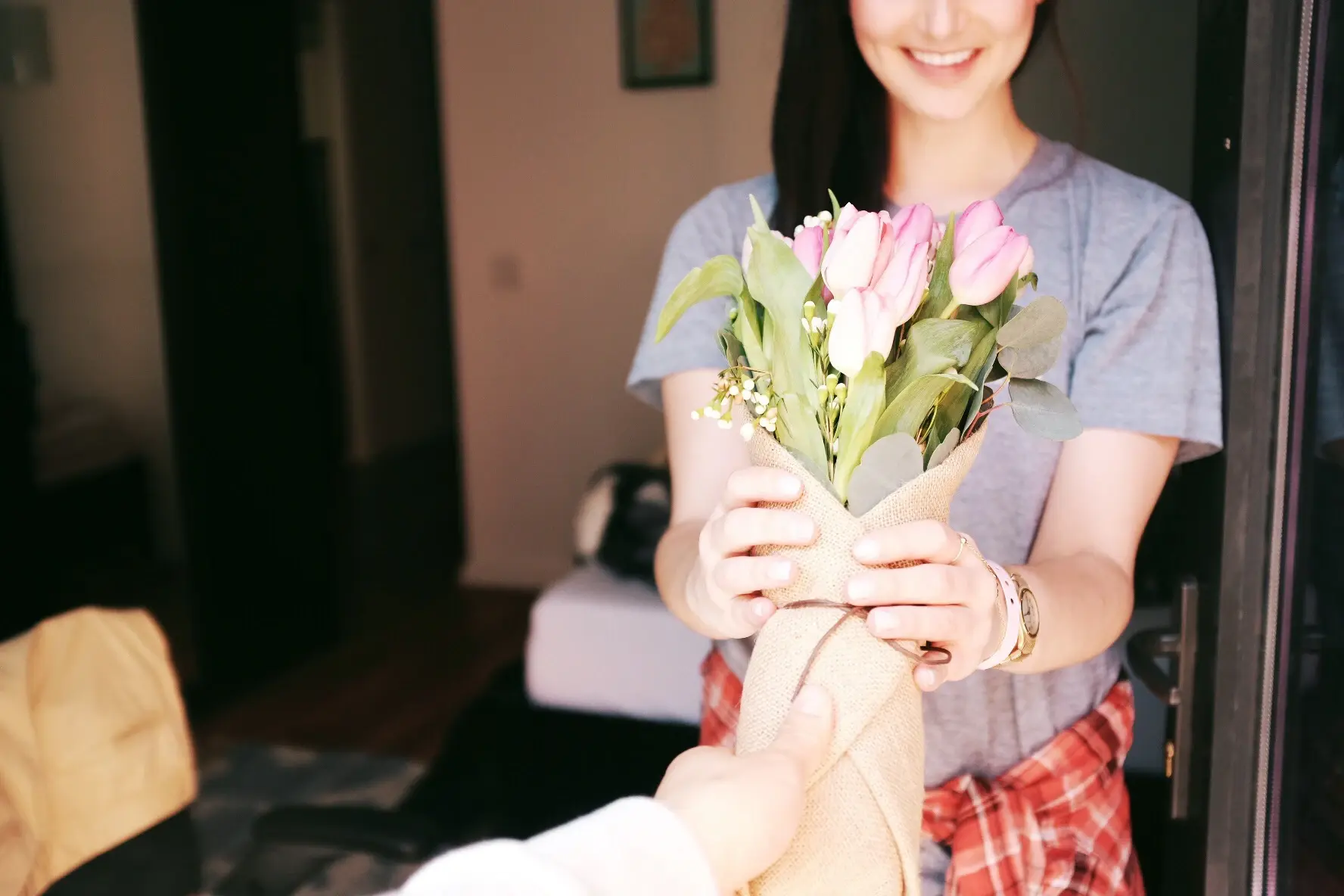 Artisan hands trimming roses