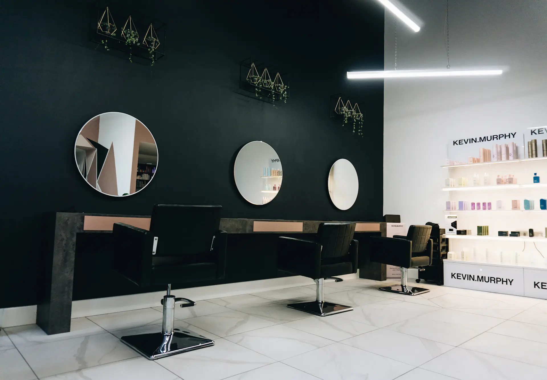 A refined private salon with soft daylight and considered furnishings