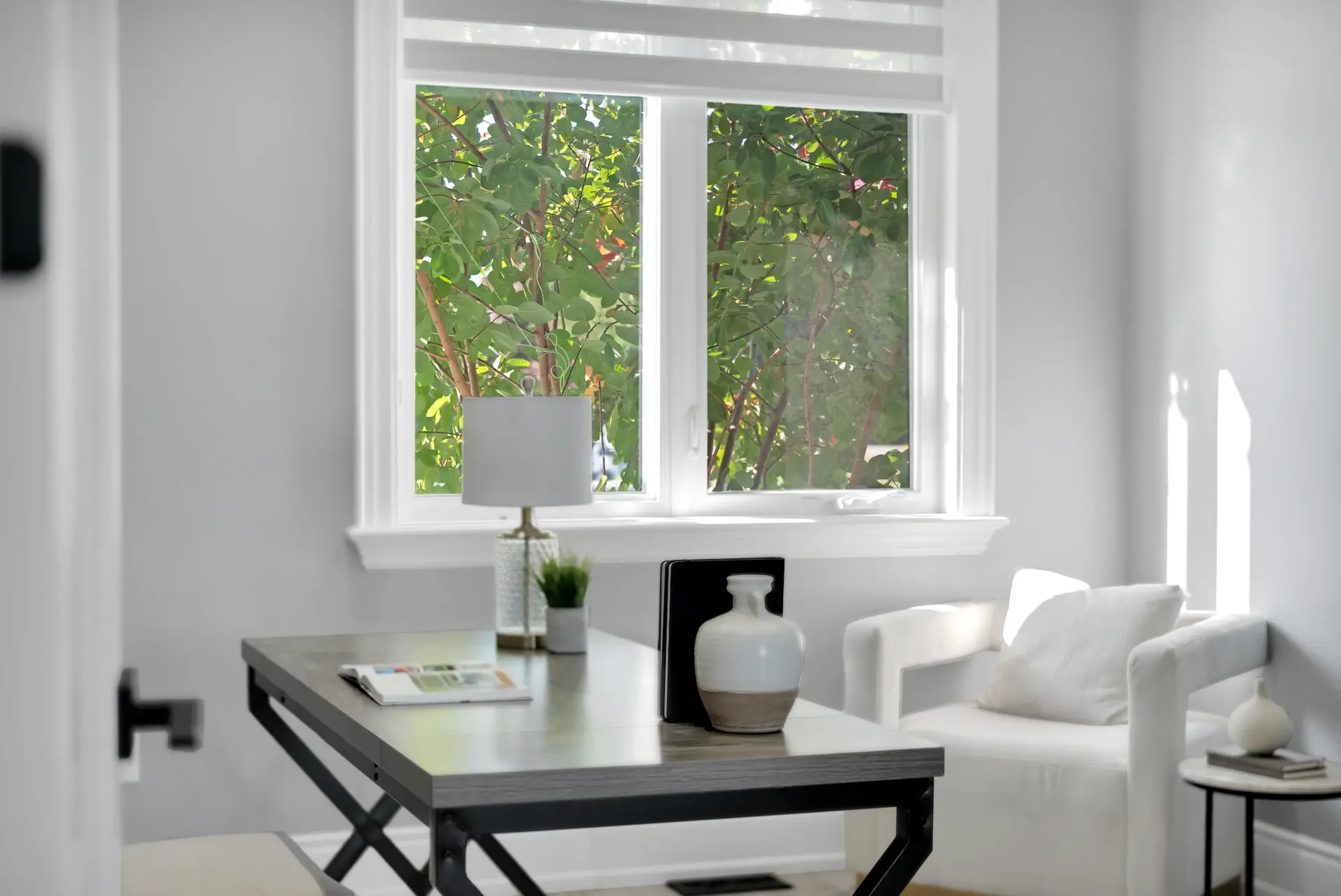 Bright editorial scene of a refined modern workspace