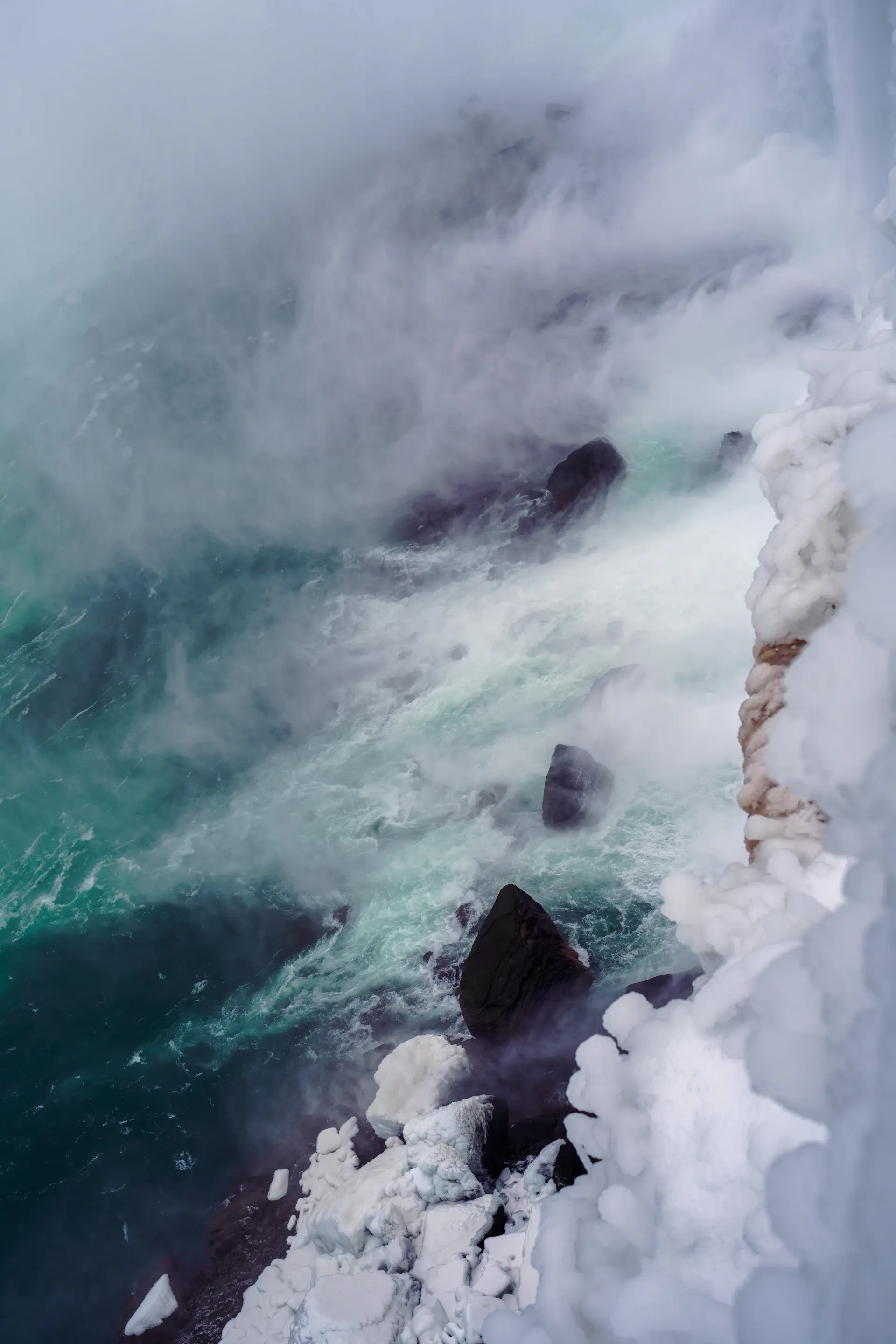 Powerful wave curling over dark Arctic water