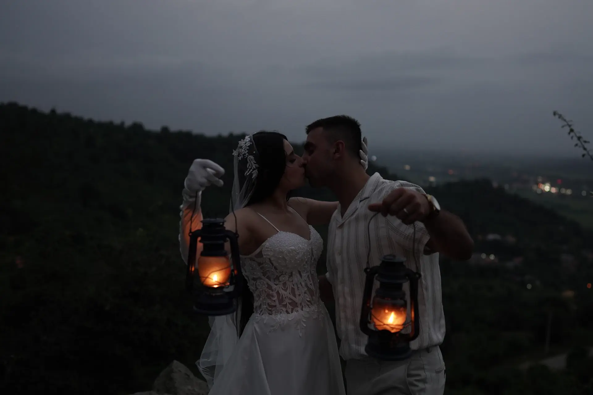 Bride and groom in an intimate candlelit portrait