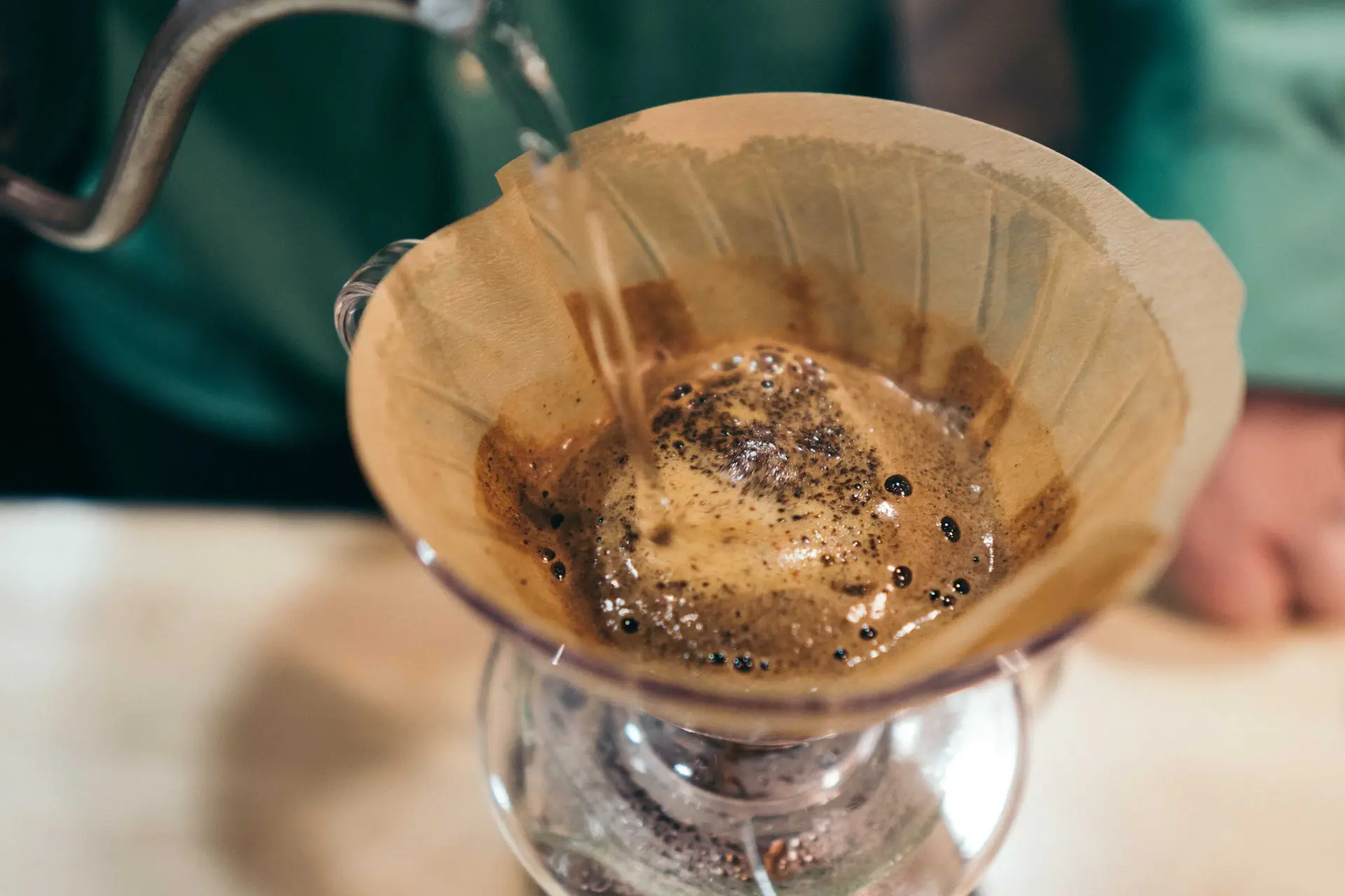Pour over coffee dripping into a glass server