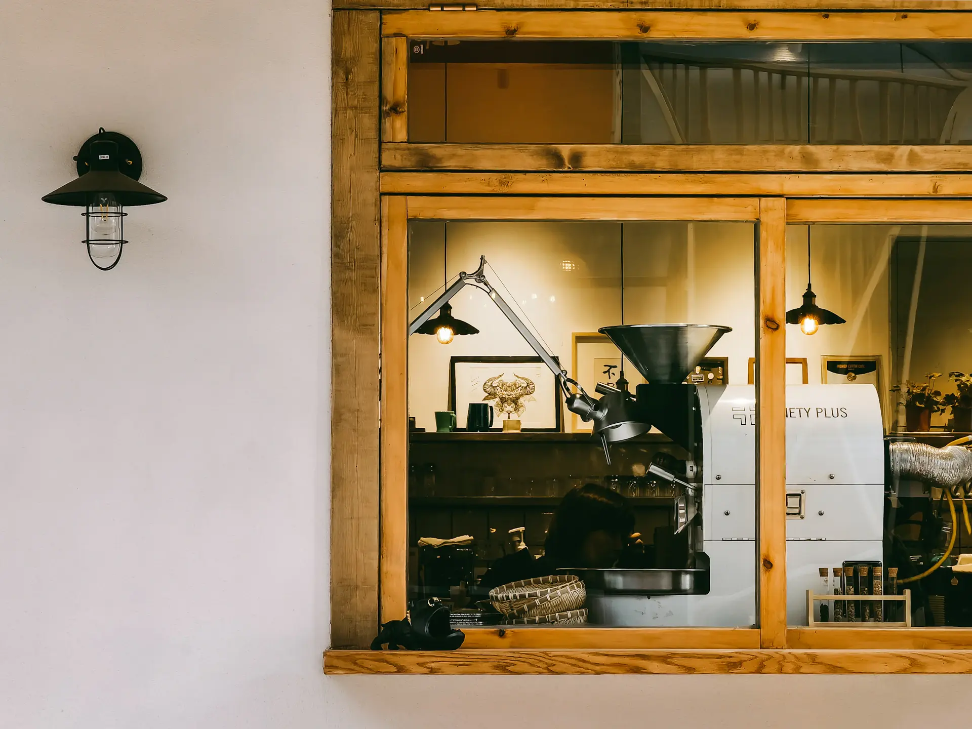 Slow-brew coffee dripping into a glass server, soft window light