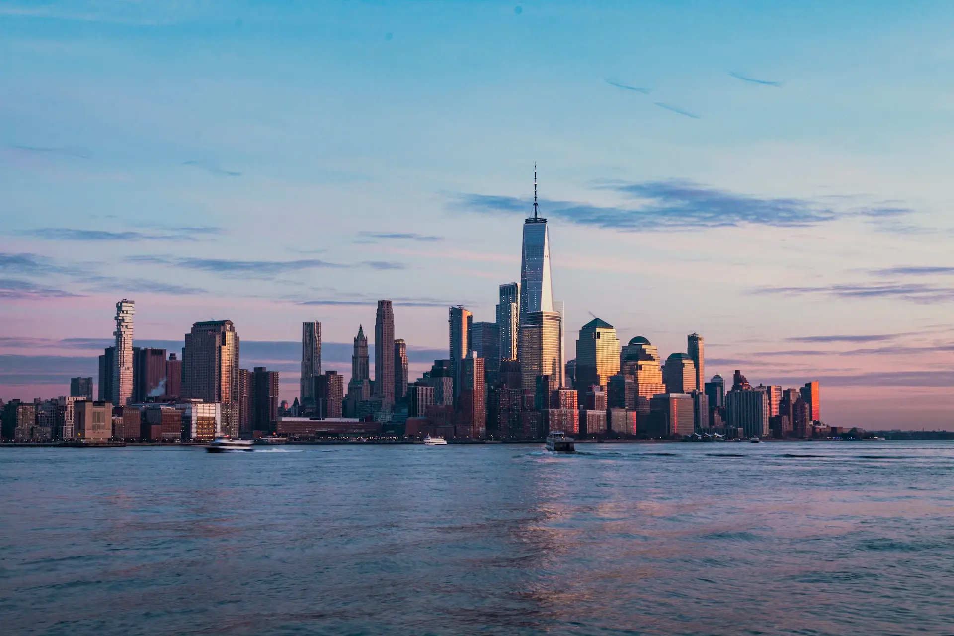 A prime skyline residence rising above the city at golden hour