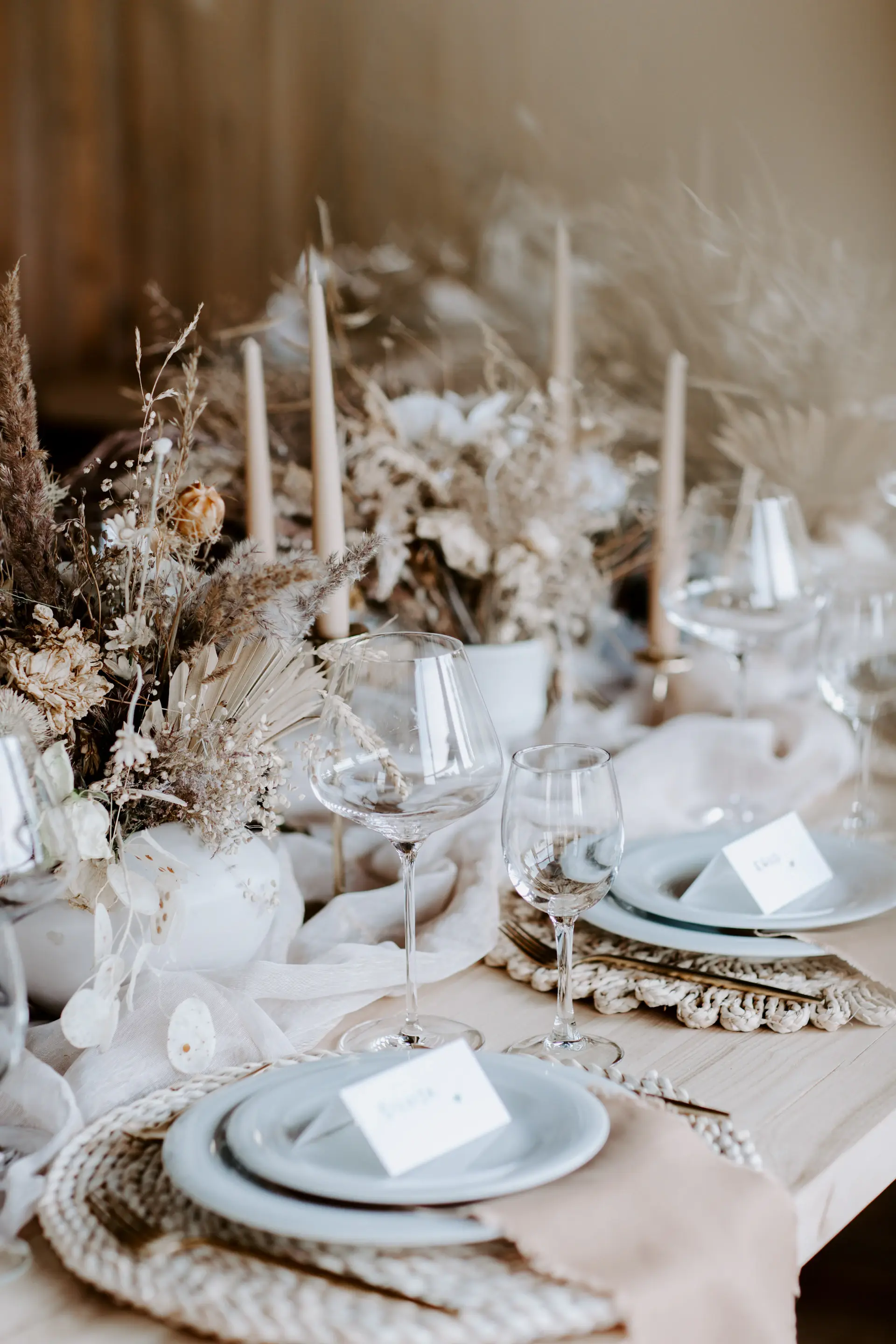A soft ivory and champagne wedding tablescape